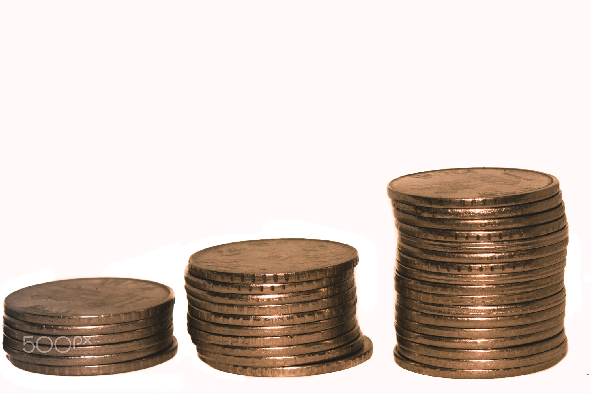 Stack of Indian rupee coins isolated on white background