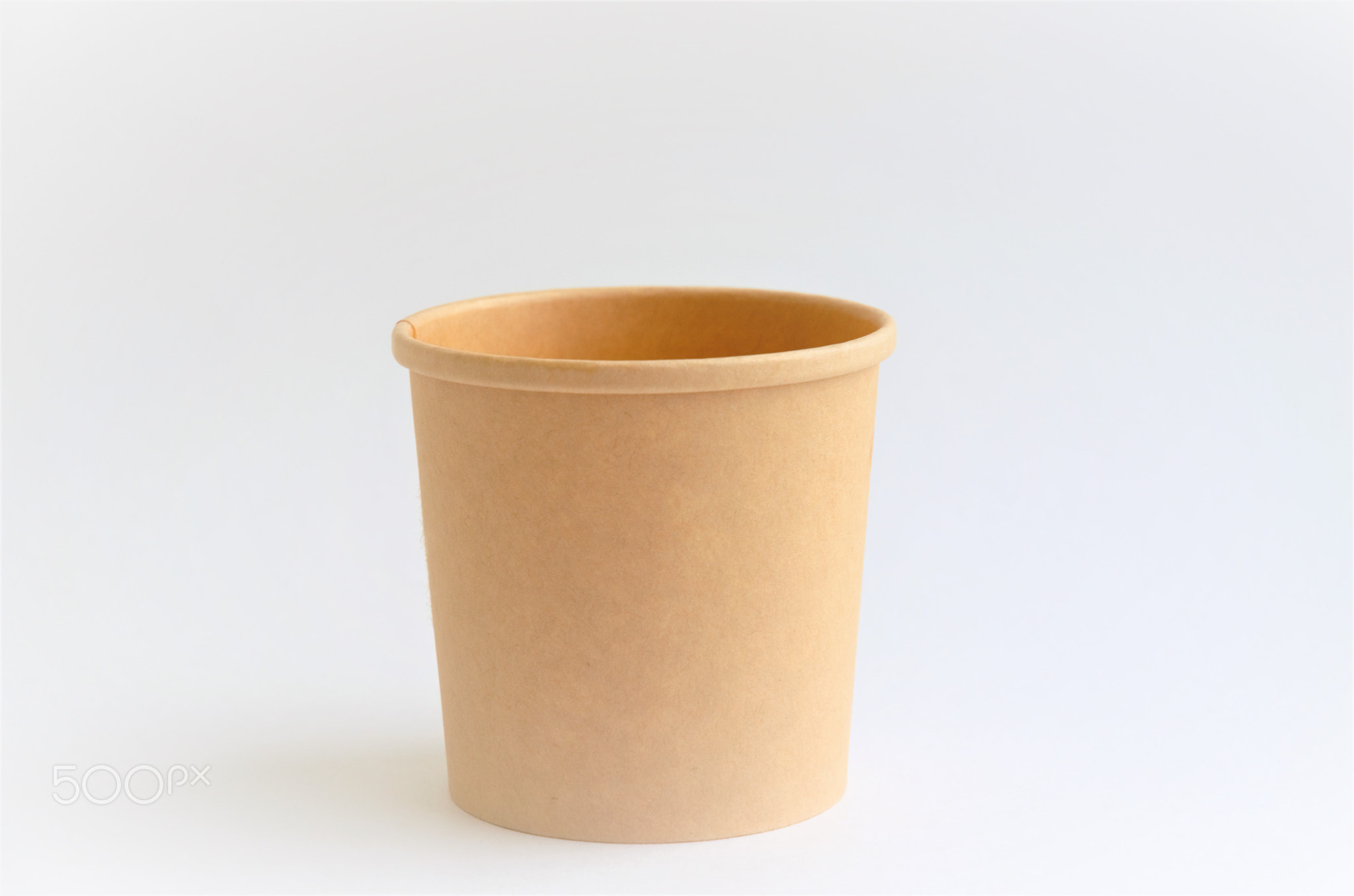 disposable craft cup on white background, minimalism
