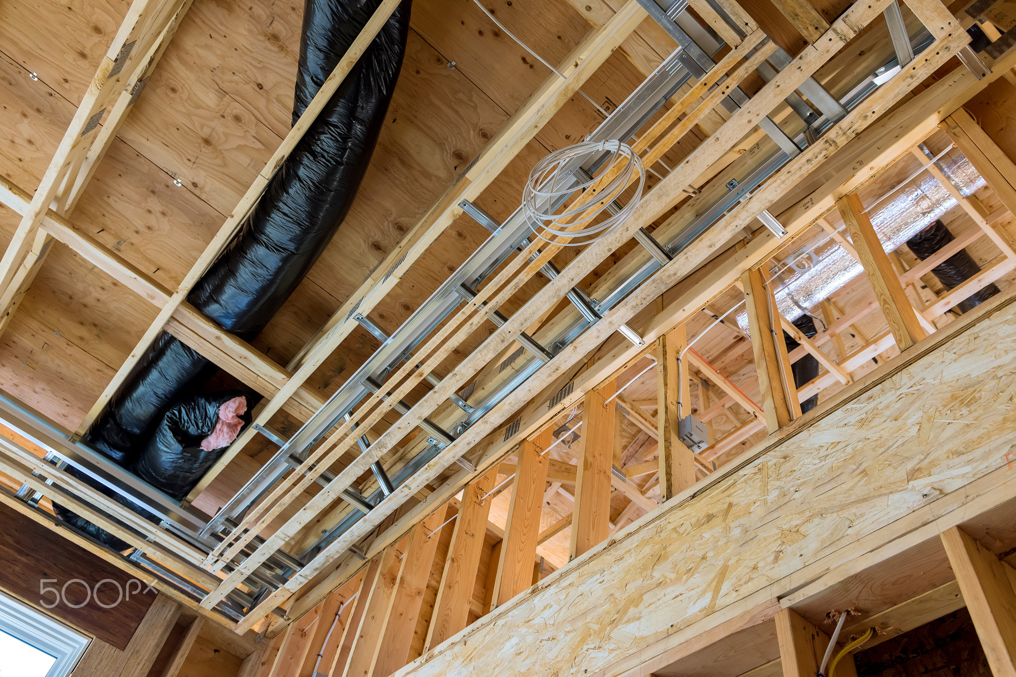 New home construction a house under the vents heating system on the