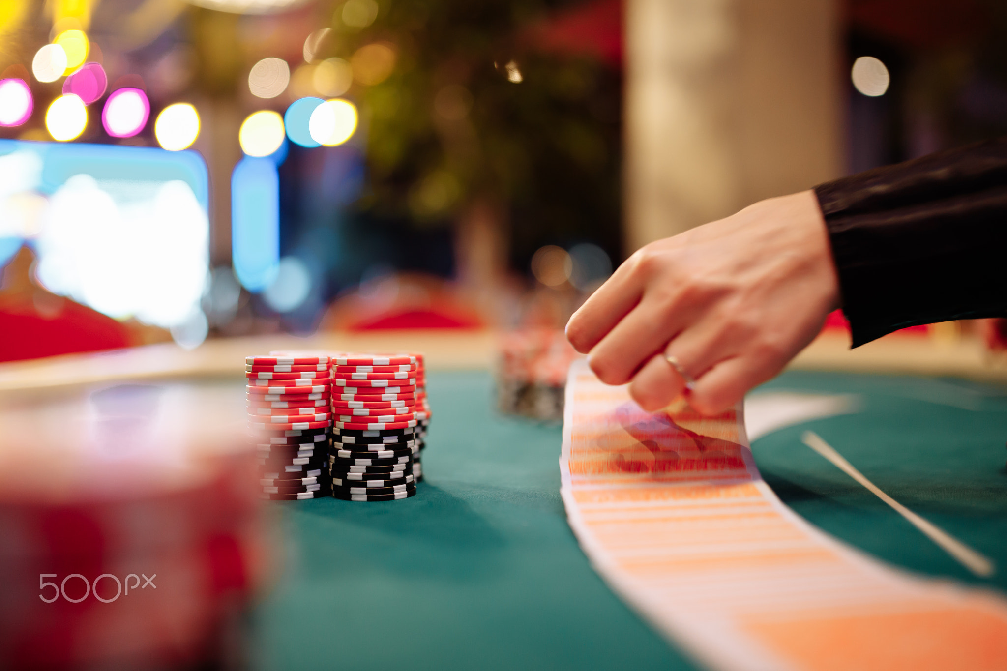 Player chips and the start of poker hands.