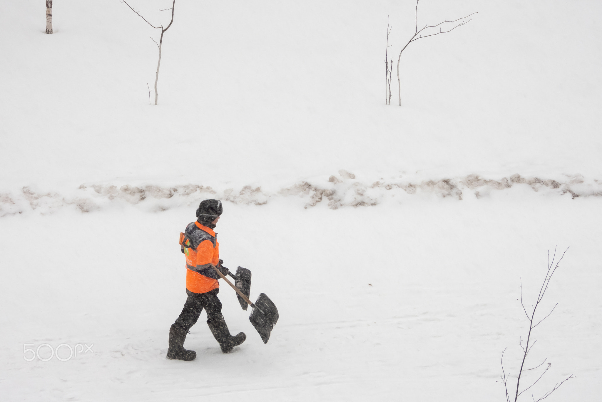 MOSCOW, RUSSIA - Jan 26, 2019. Cleaning the road after snowfall