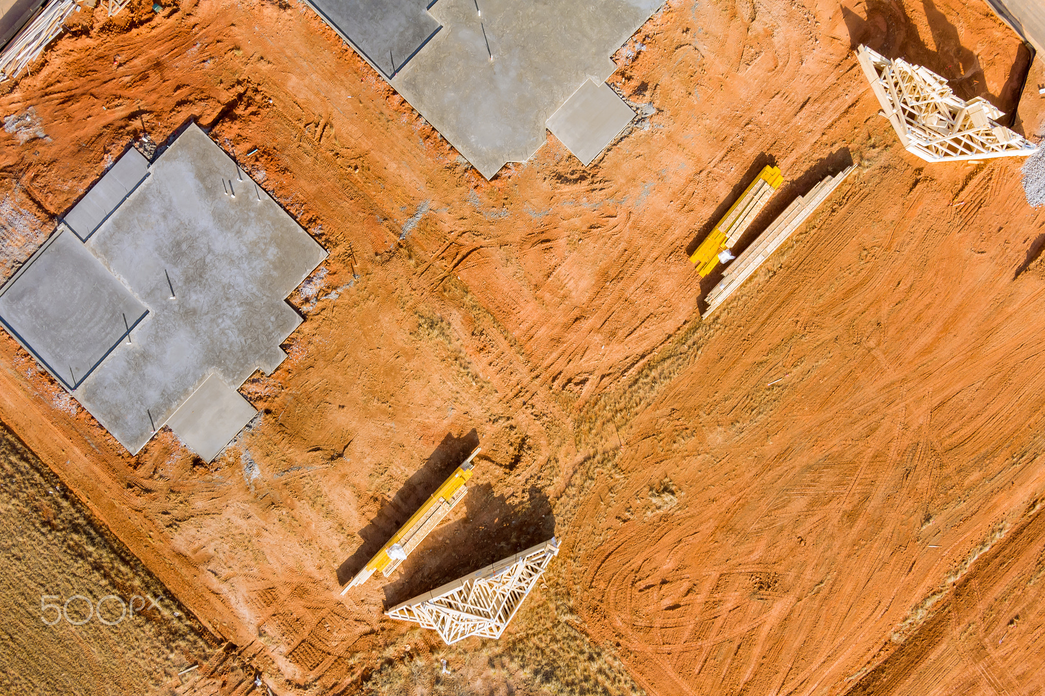 Construction laying the concrete foundation of an apartment house