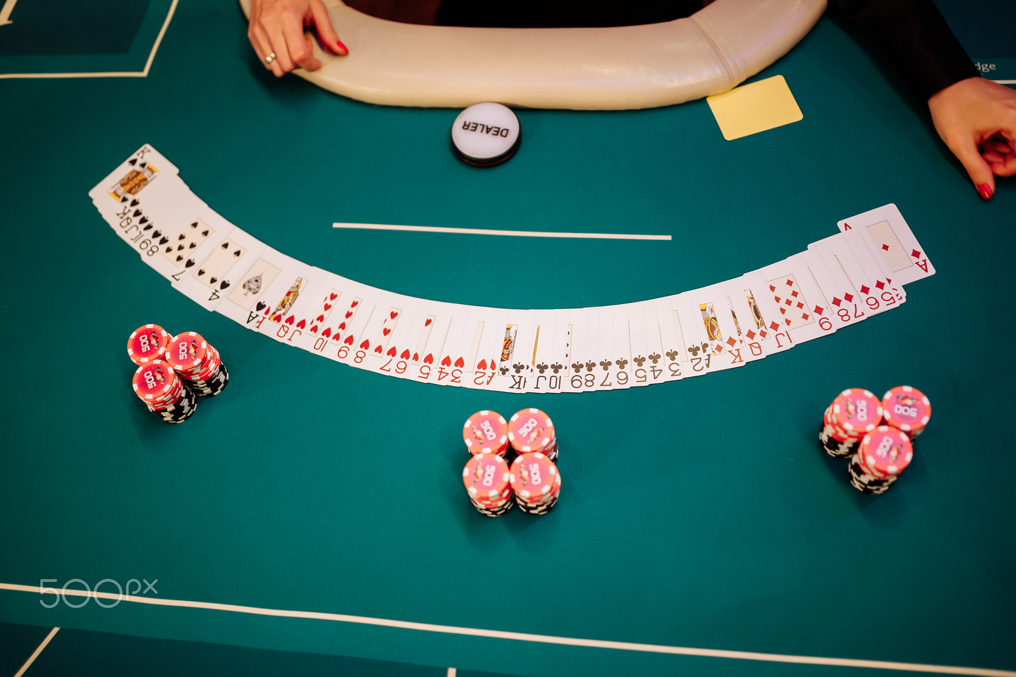 Player chips and the start of poker hands.