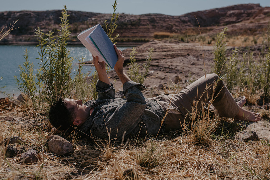 Guy Reading/Journaling by Kyle Kuhlman on 500px.com