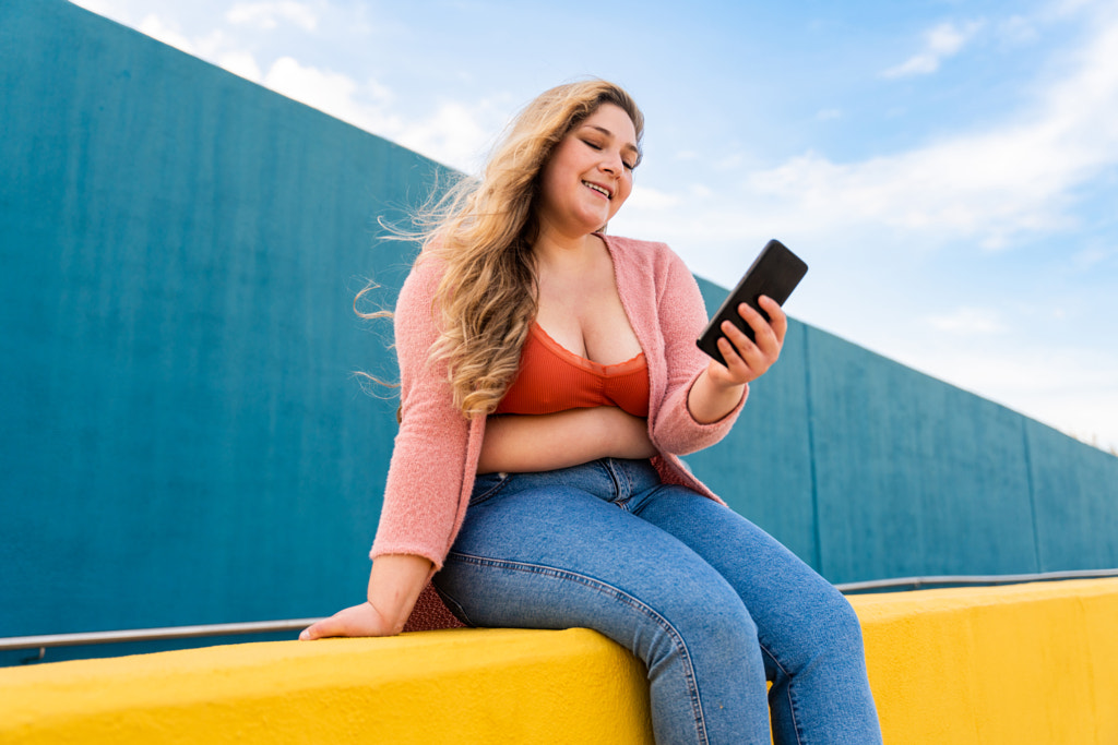 Beautiful plus size young woman outdoors by Fabio Formaggio on 500px.com