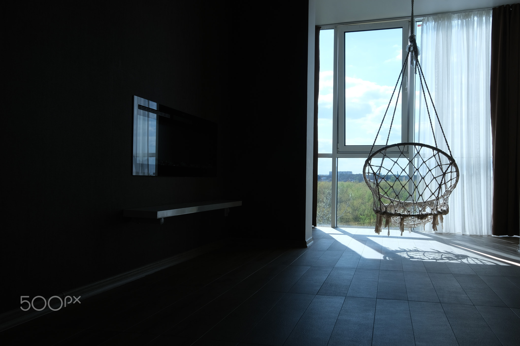 White wicker swing chair, cute interior. bedroom, cozy house. The