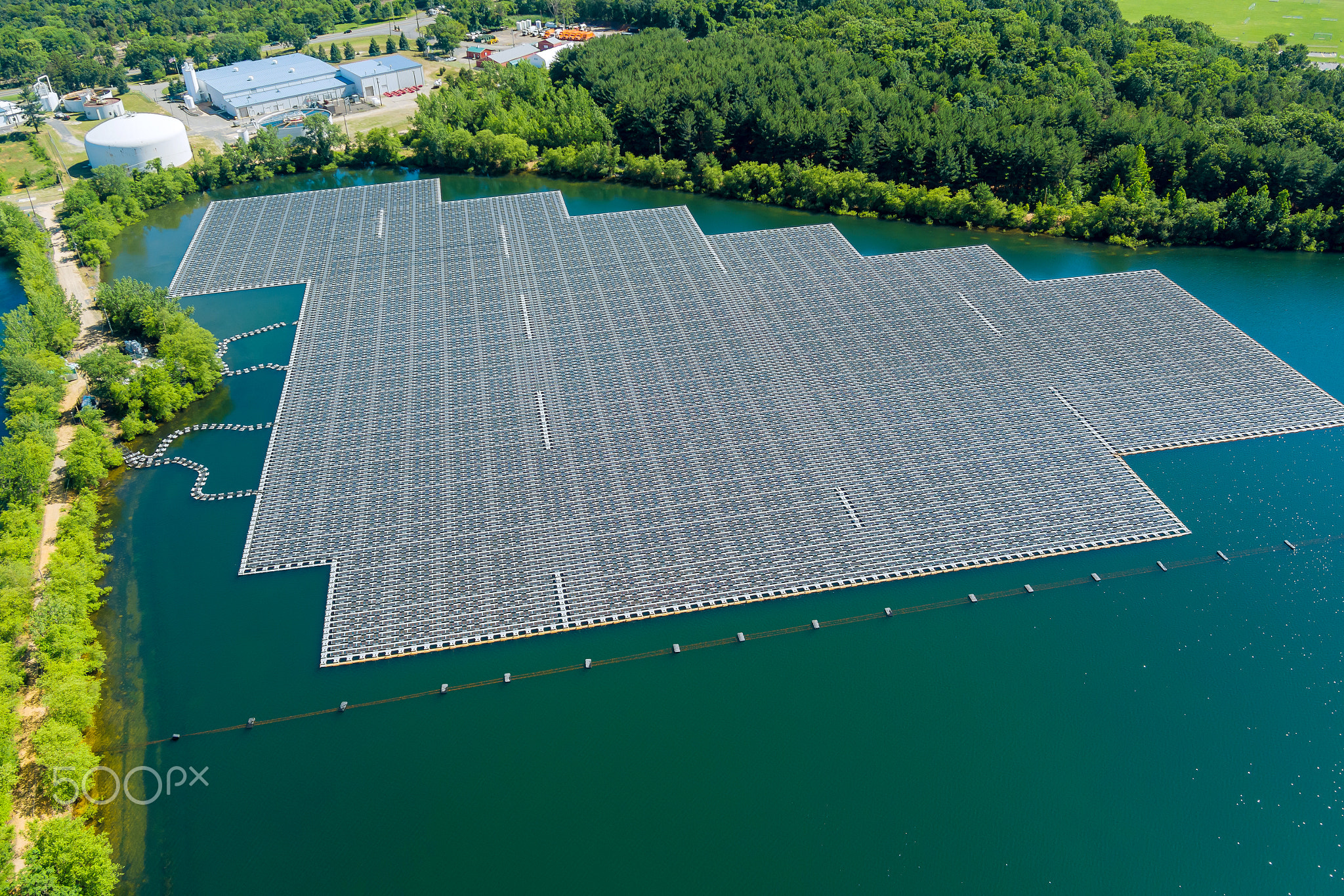 Solar farm panels in aerial view, array of polycrystalline