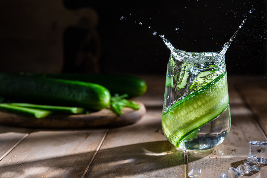 cucumber soft summer drink on a dark background by Olga Ilina on 500px.com