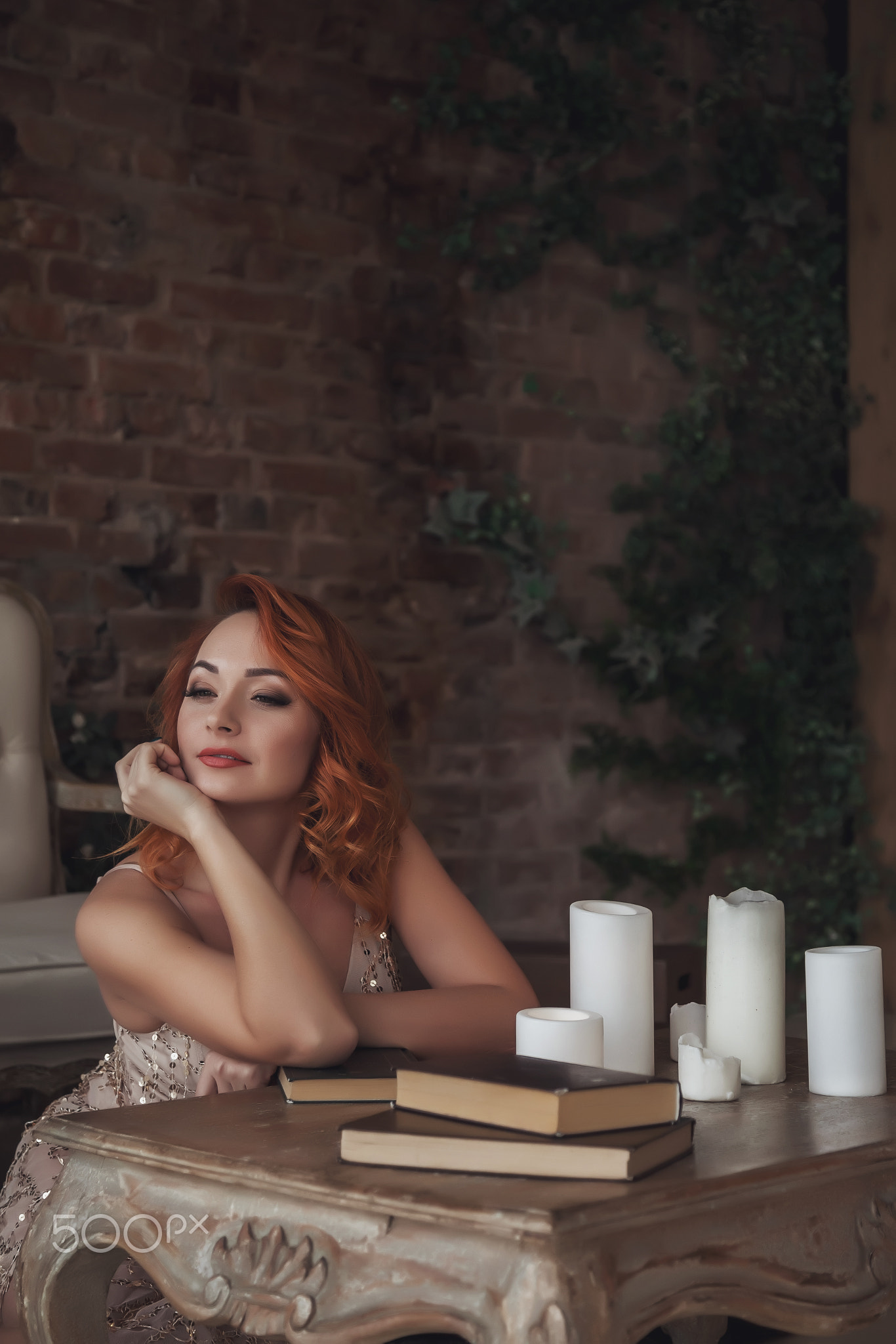 Pretty, slender woman with beautiful red hair