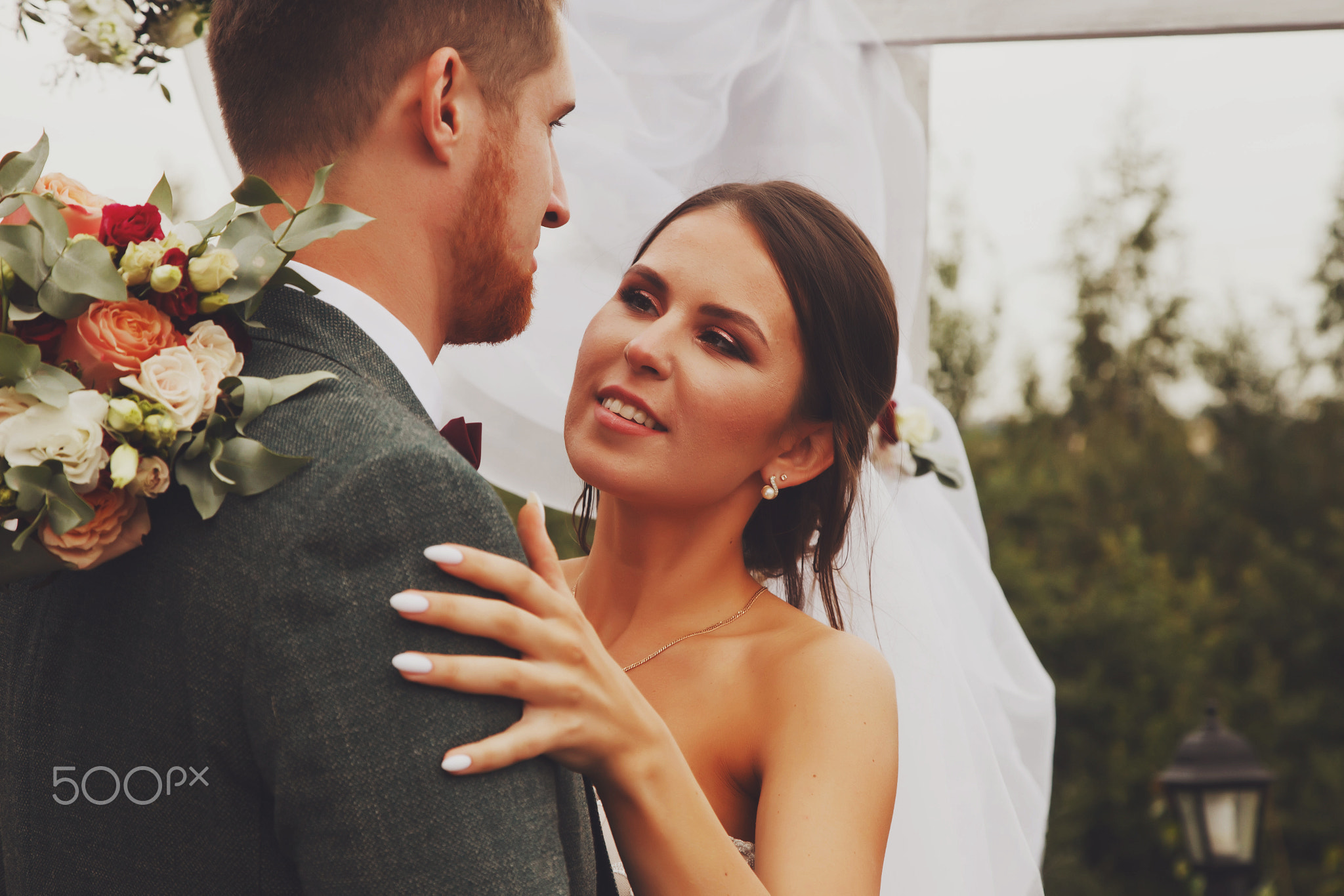 Bride and groom irish style on wedding ceremony in country village house