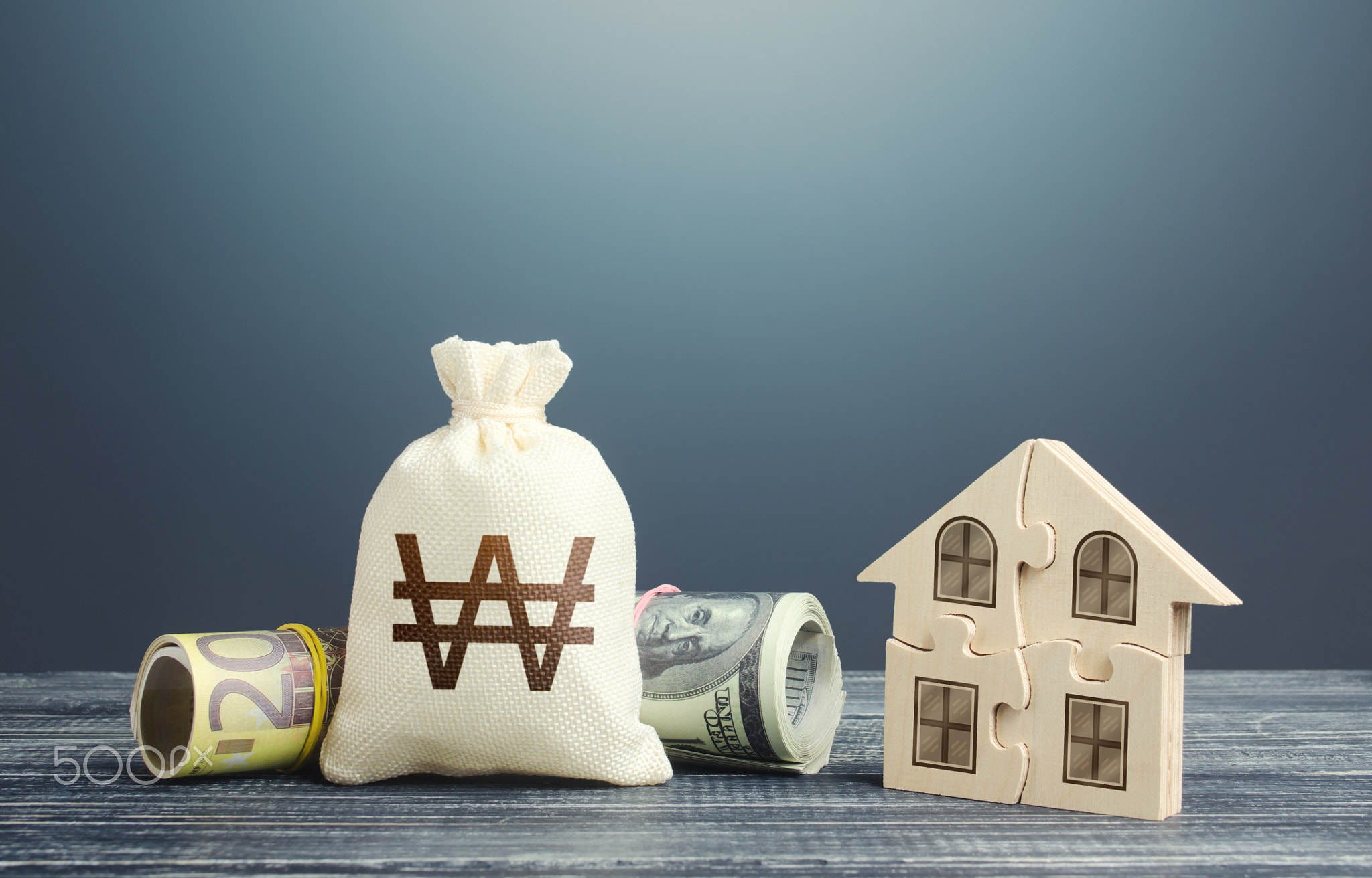 South korean won money bag and puzzle house.