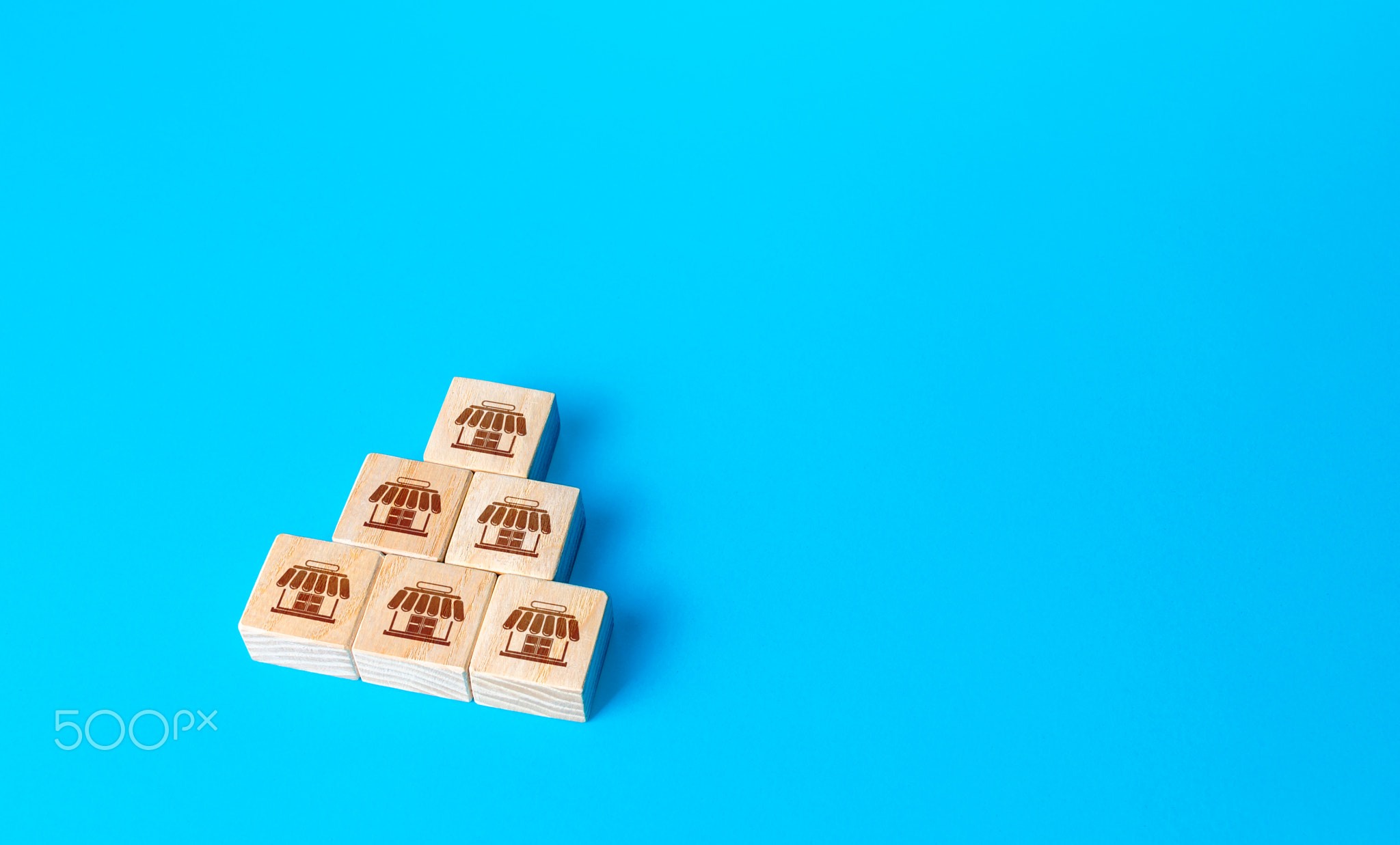 Block pyramid with shop symbols.