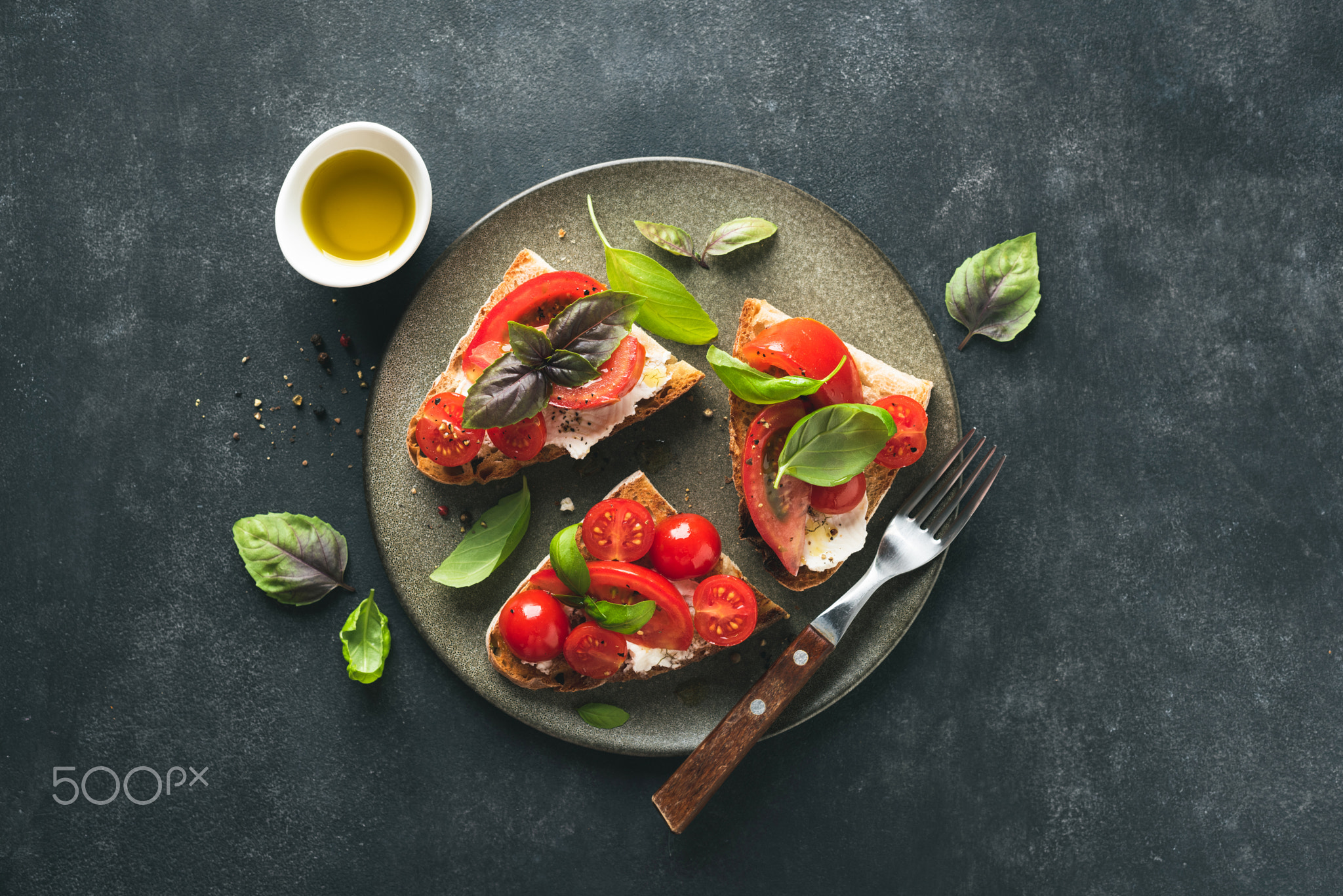 Italian tomato bruschetta with soft ricotta cheese