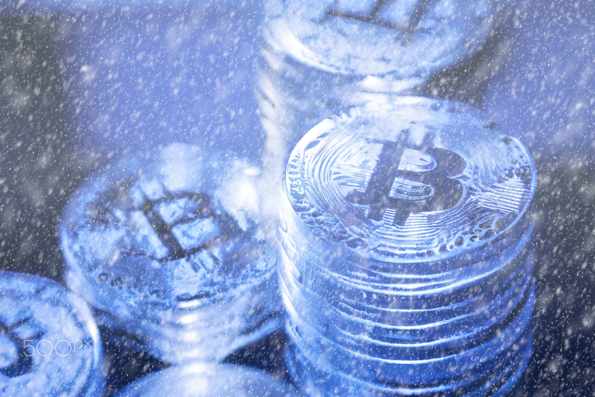 Concept for Crypto winter, Bitcoin in blue ice. Bitcoin price crash