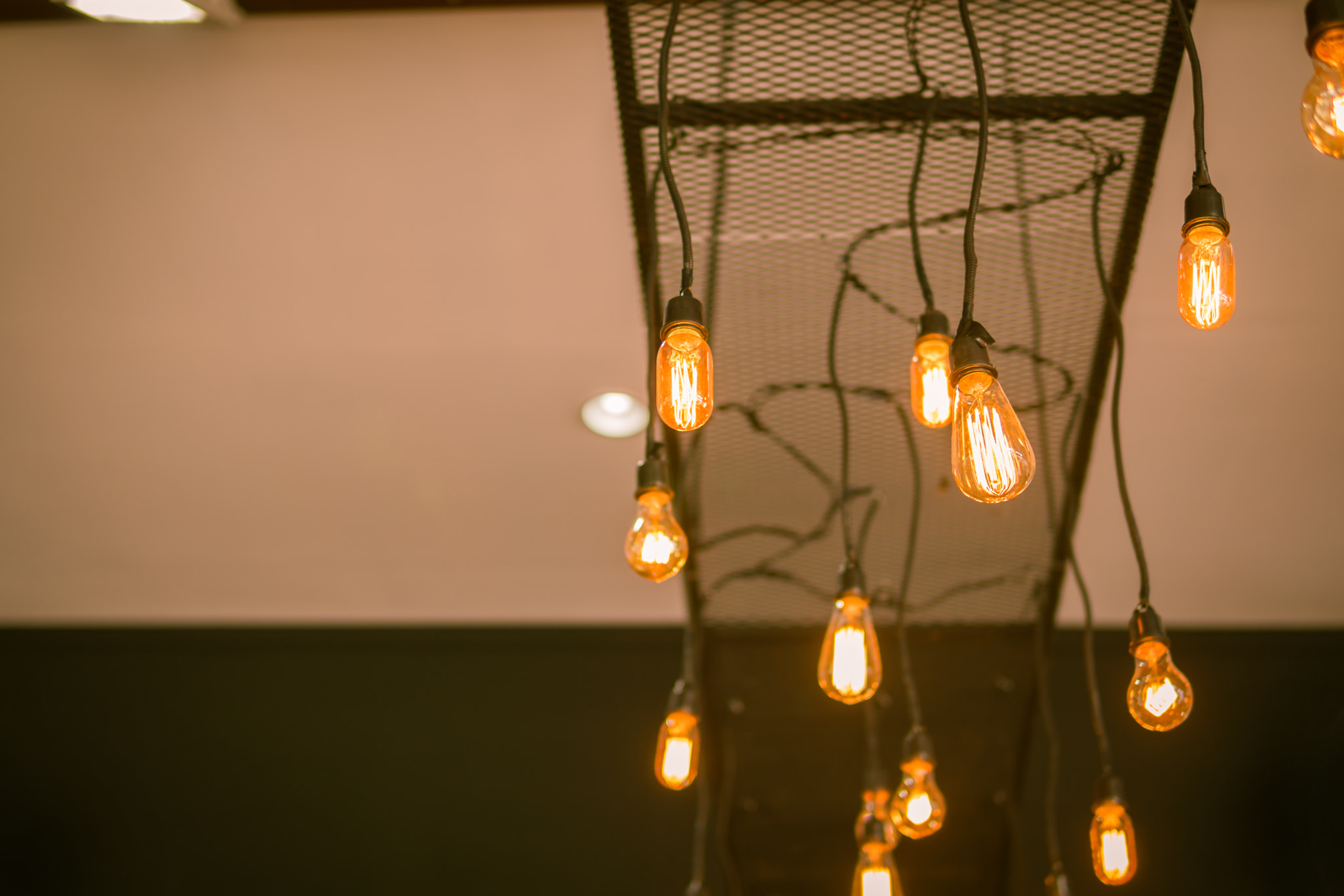 Vintage tungsten lightbulbs. Selective focus vintage lighting on the cieling for decoration.