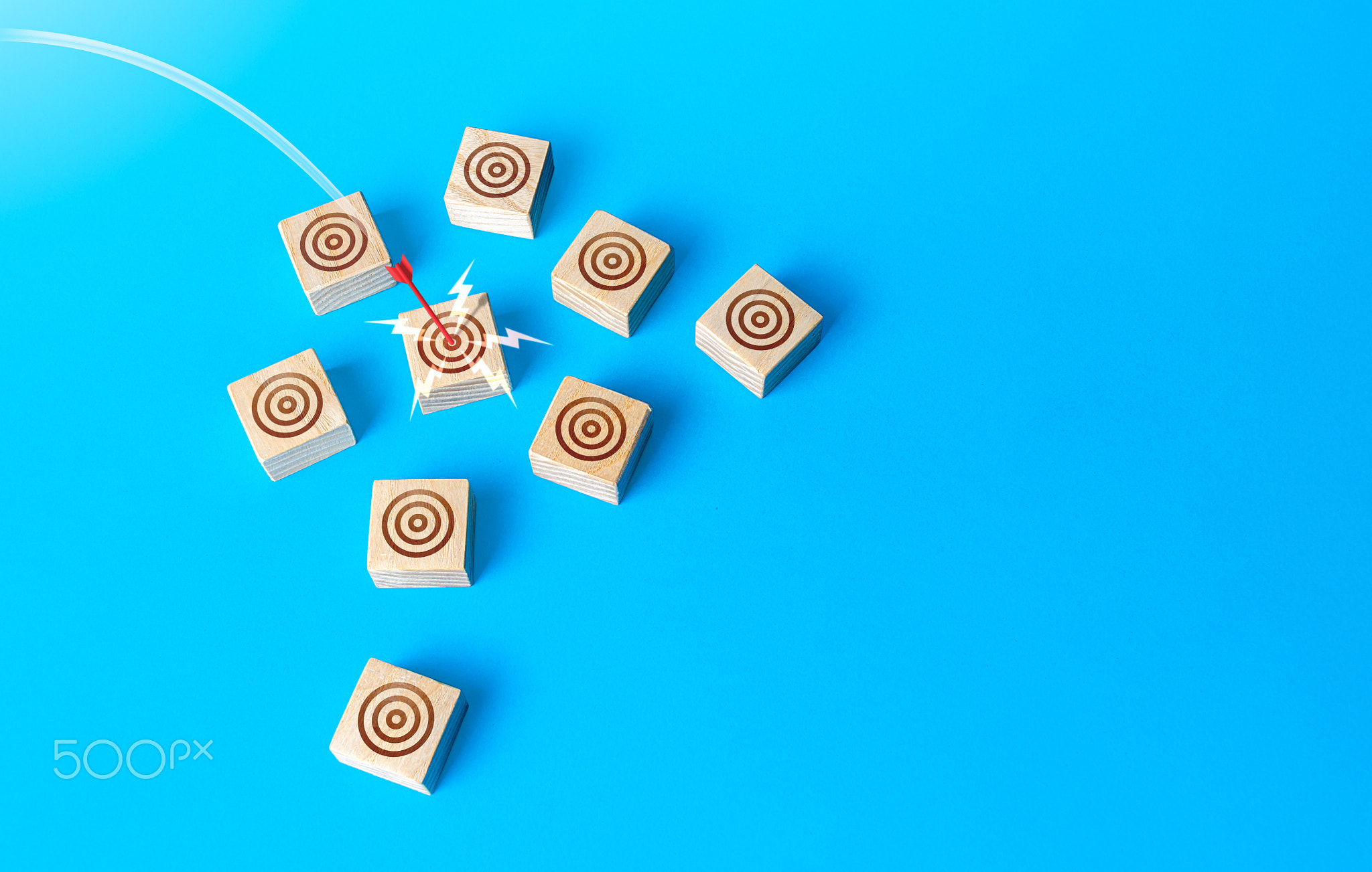 Red bow arrow hits a target circle.