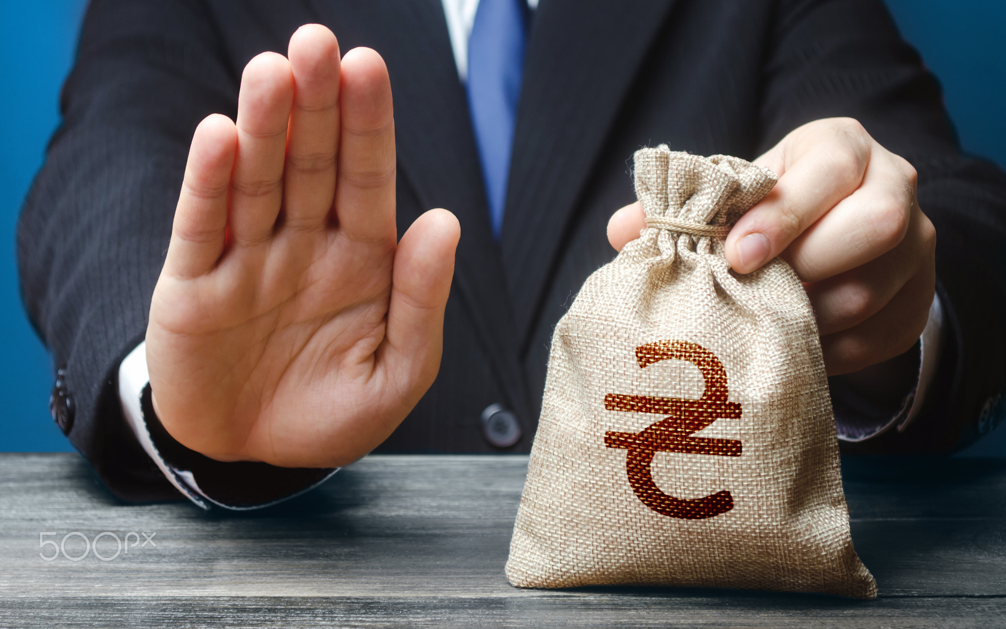 Businessman refuses to give ukrainian hryvnia money bag. 