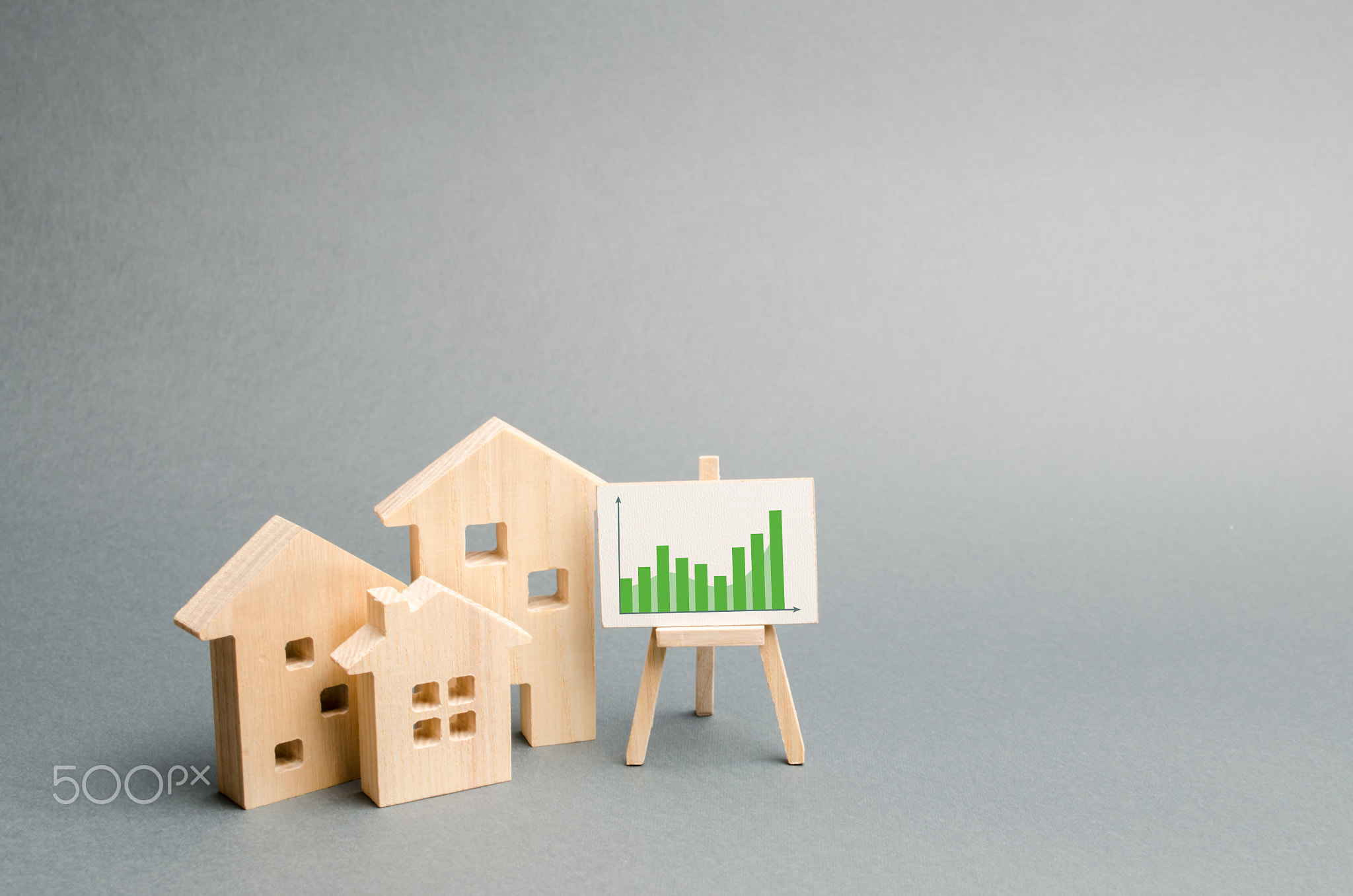 Wooden houses with a stand of graphics and information.