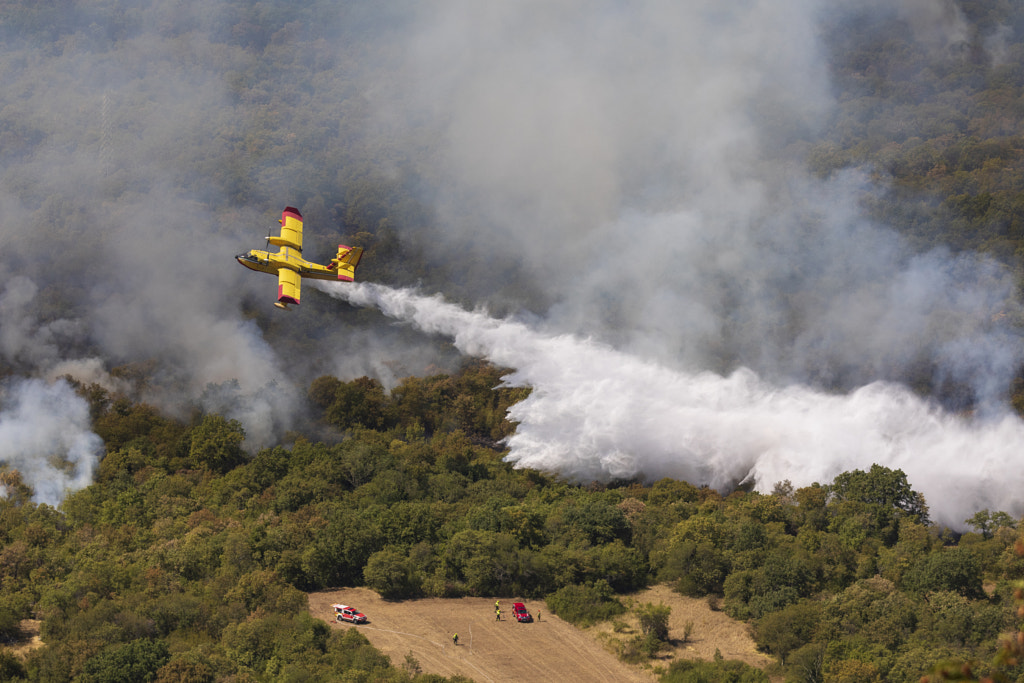 Firefighter Airplane Putting Out a Fire by Jure Batagelj on 500px.com