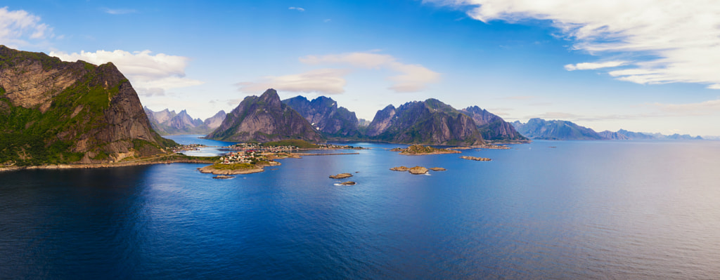 Panorama of Reine fishing village and high mountains on Lofoten by Nick Fox on 500px.com