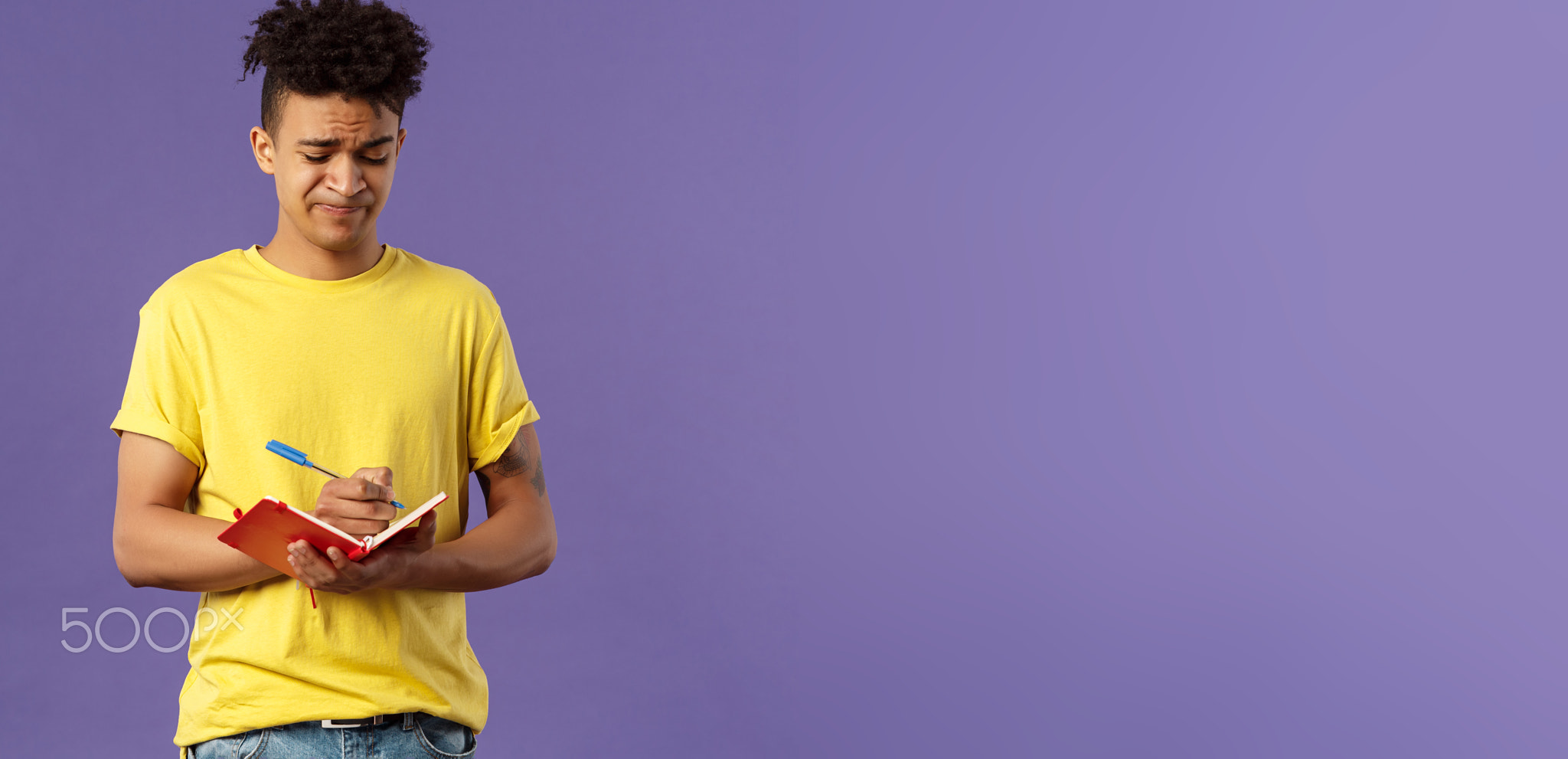 Portrait of unamused, displeased and bothered young man having