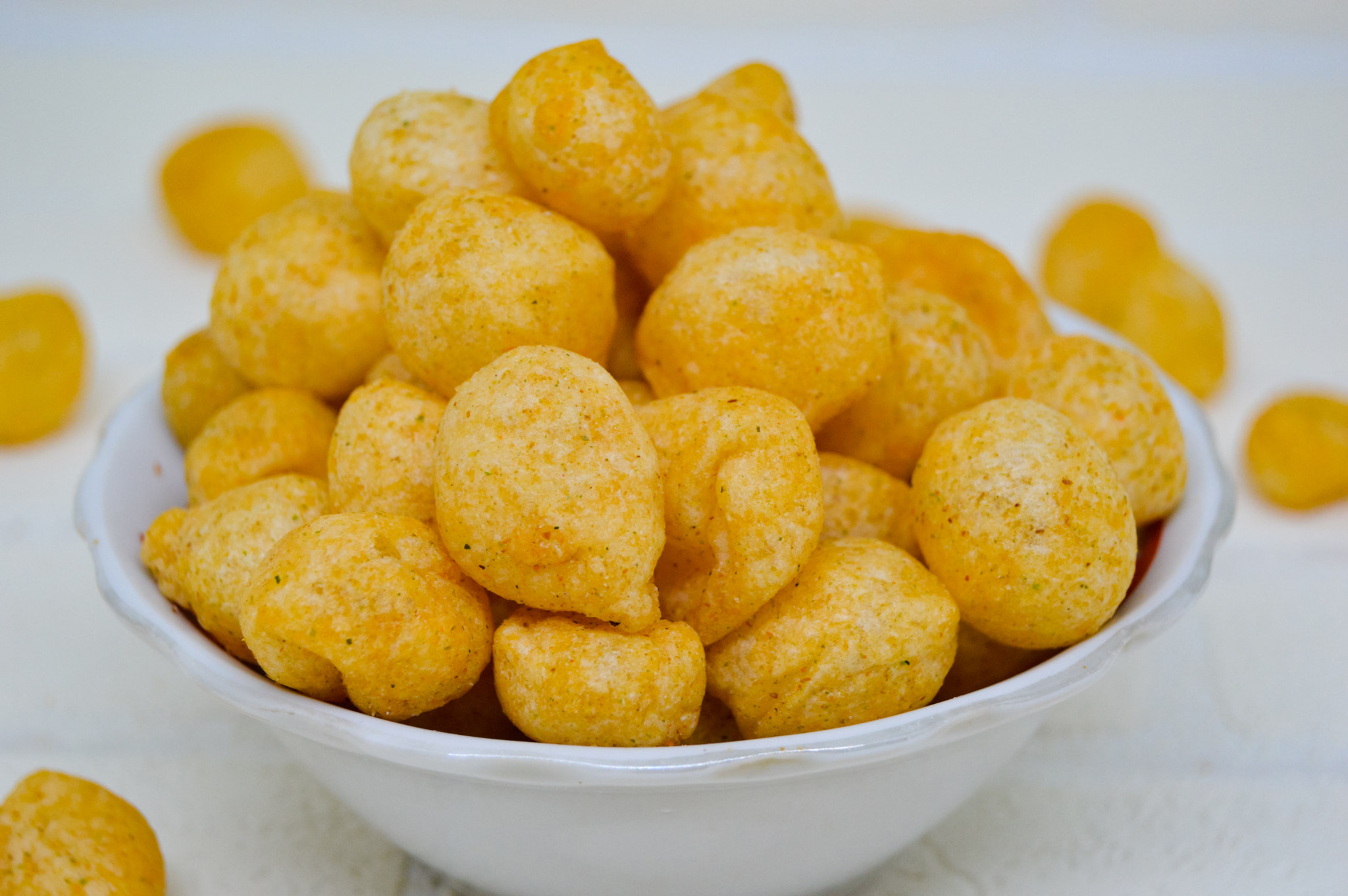 Tasty and delicious Cimol in a bowl with a white background.