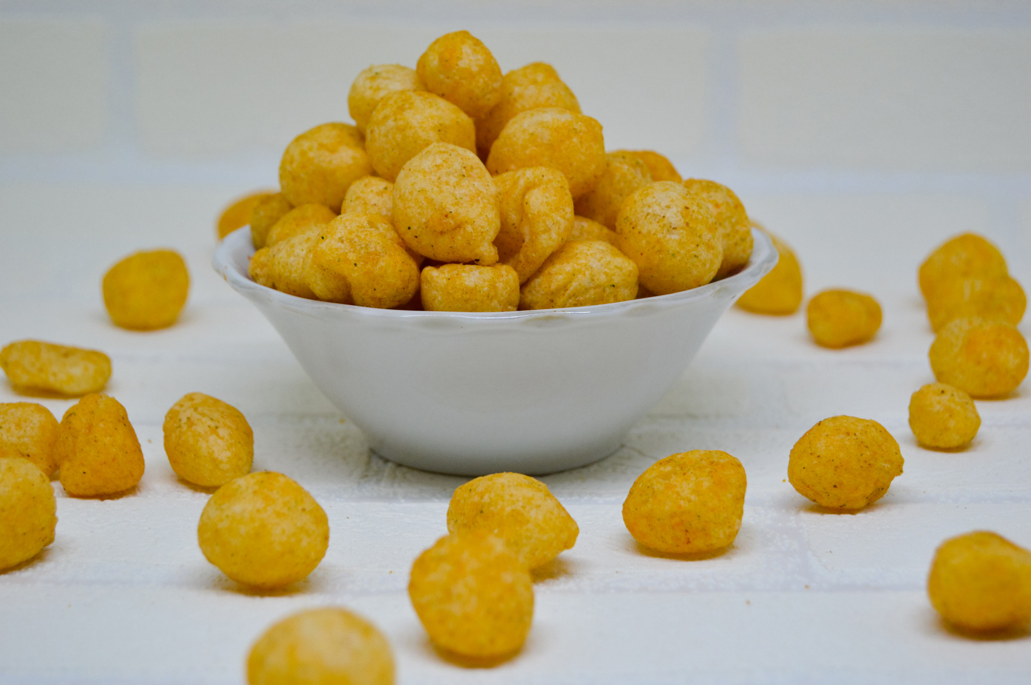 Tasty and delicious Cimol in a bowl with a white background.