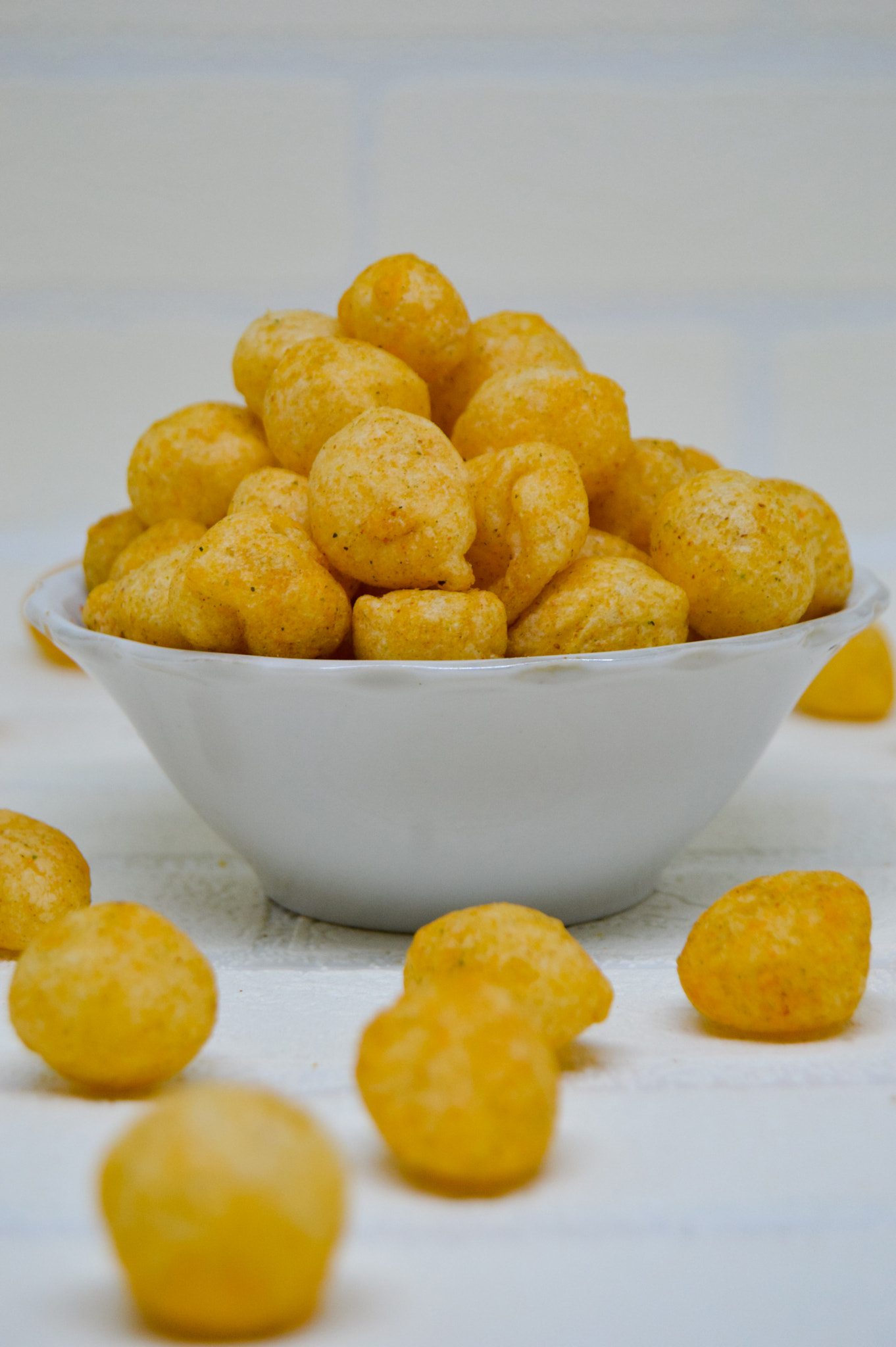 Tasty and delicious Cimol in a bowl with a white background.