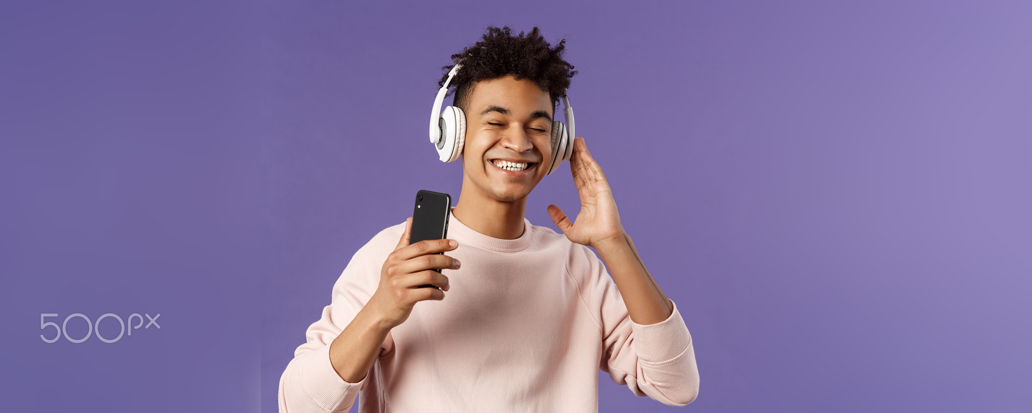 Technology and lifestyle concept. Portrait of carefree attractive