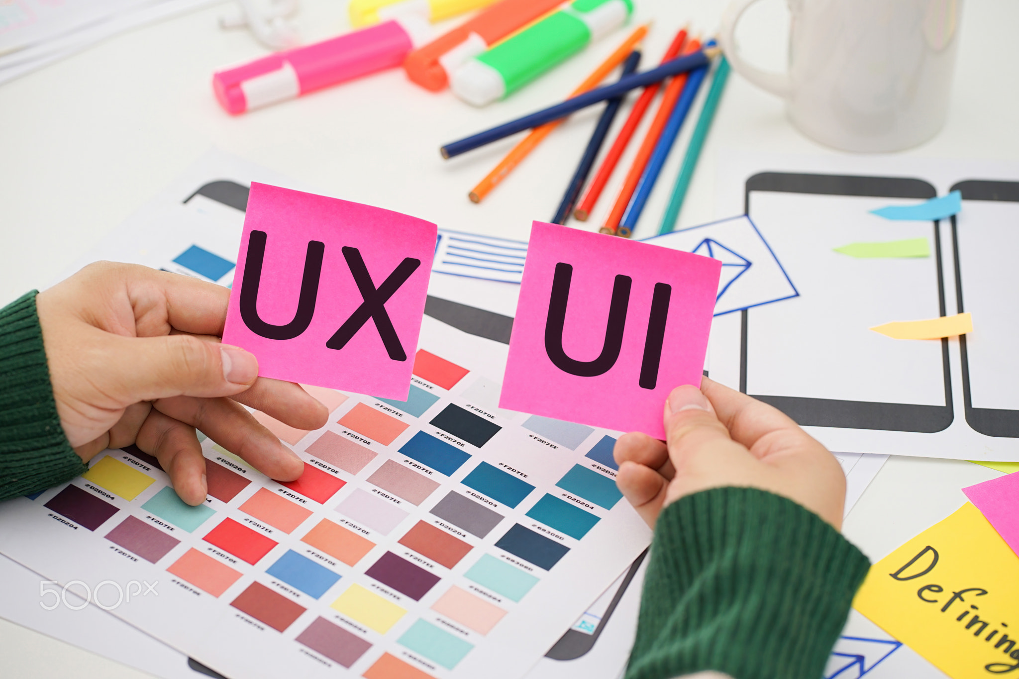 Creative top view photo of UX UI designer working space. User