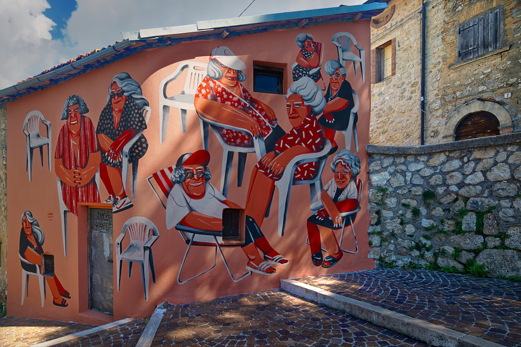 The village and the mural by VincenzoC on 500px.com