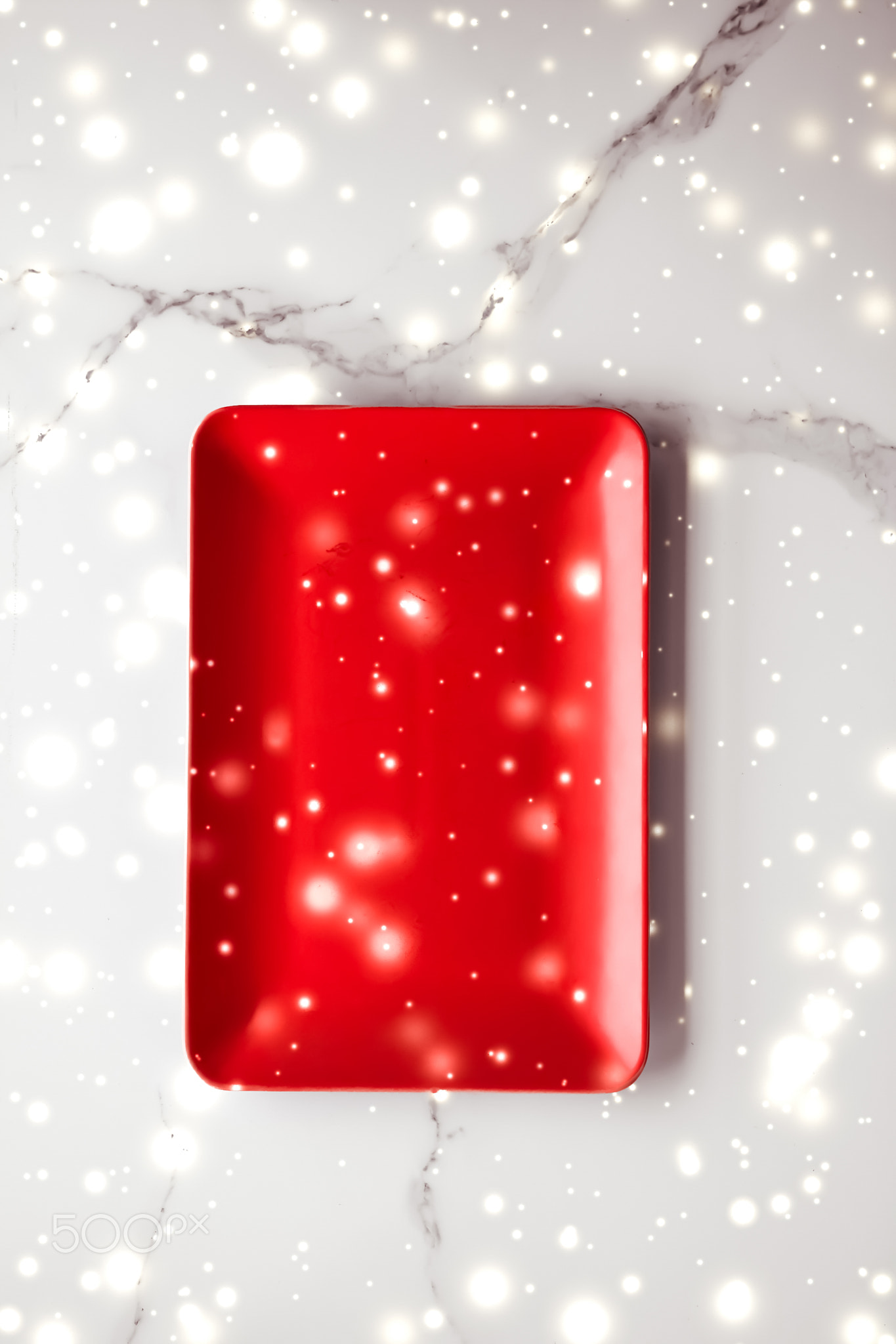 Red empty plate on marble table flatlay background, tableware