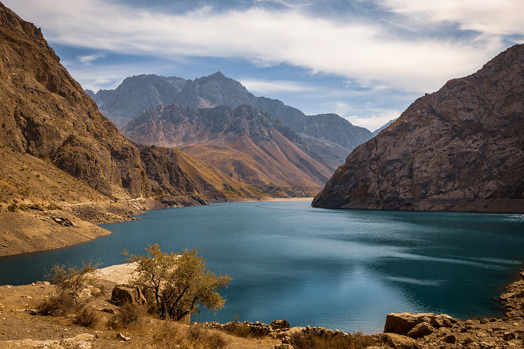 Scenic view of lake and mountains against sky by Demitry Skorinoff on 500px.com