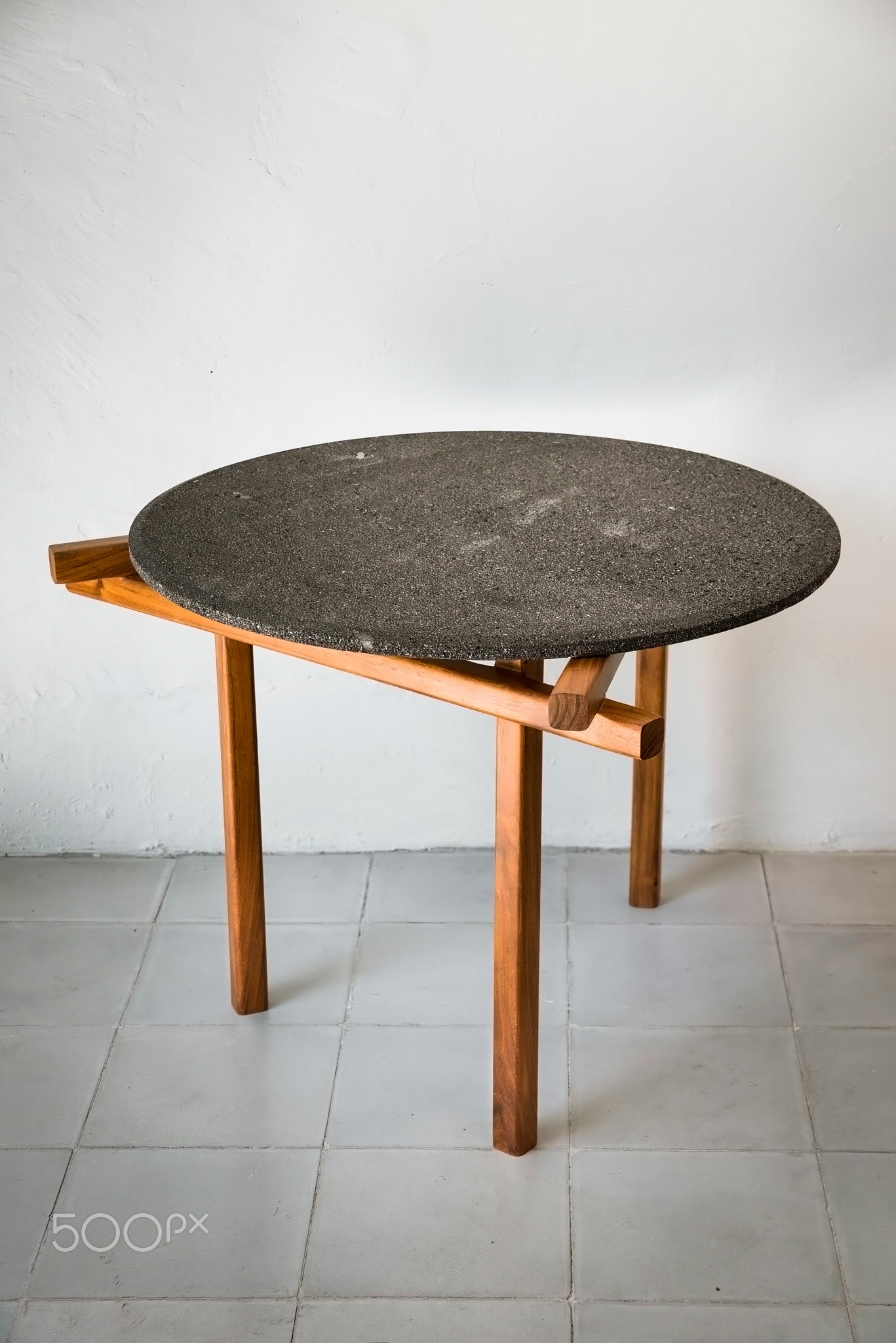 designer side or center coffee table, top in natural stone, volcanic stone, quarry or terrazz