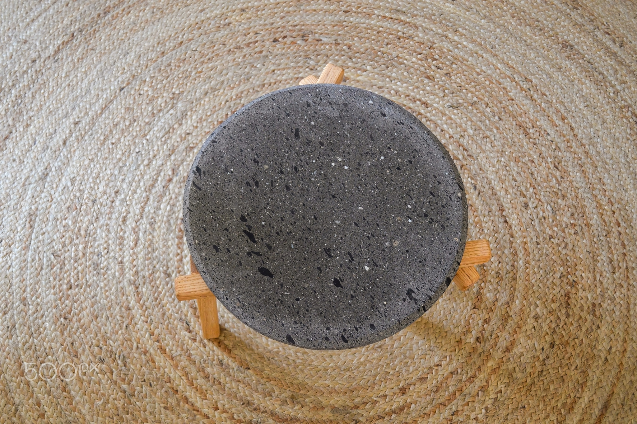 designer side or center coffee table, top in natural stone, volcanic