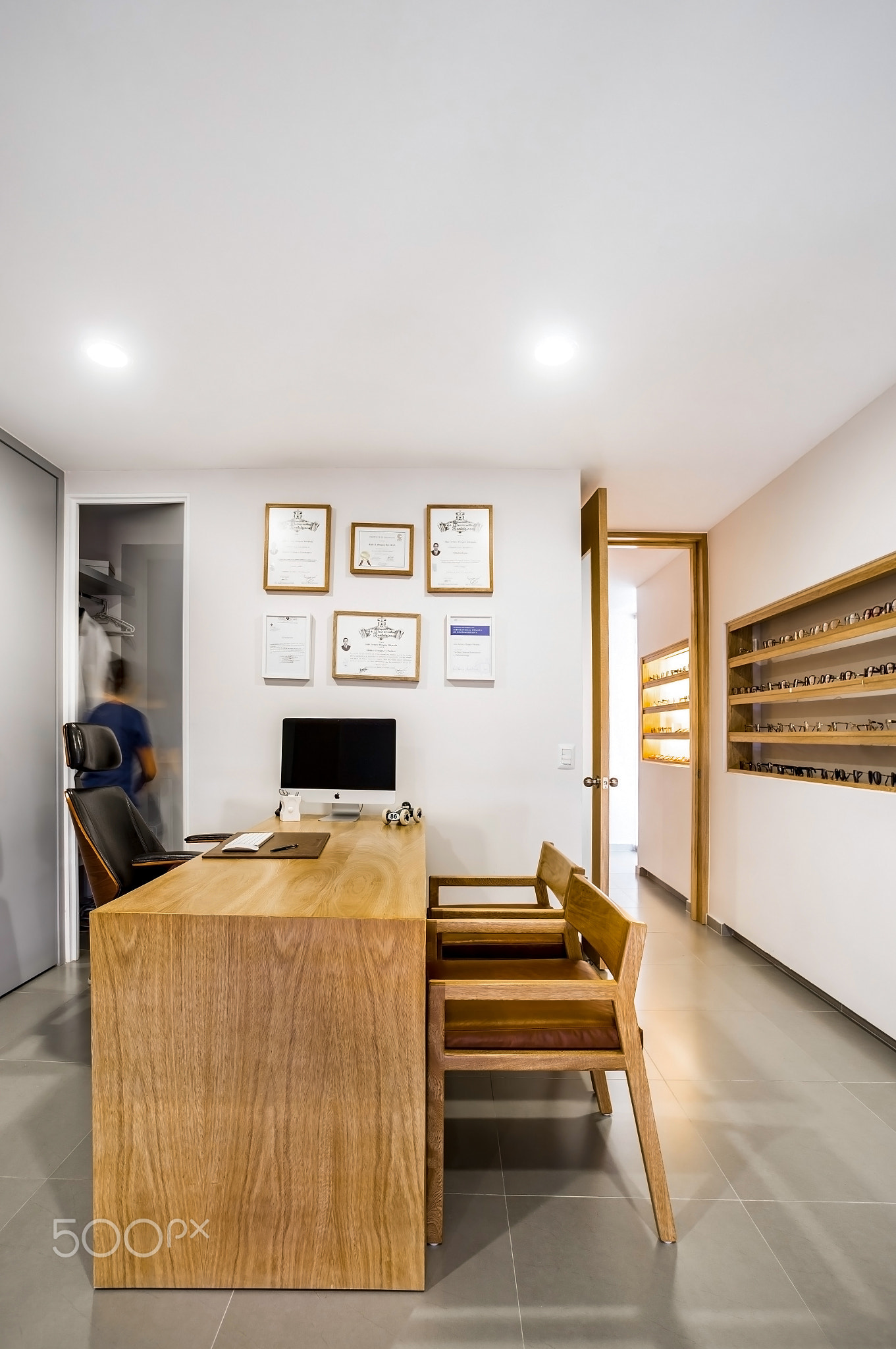 ophthalmologist's office wooden consulting room with computer on the