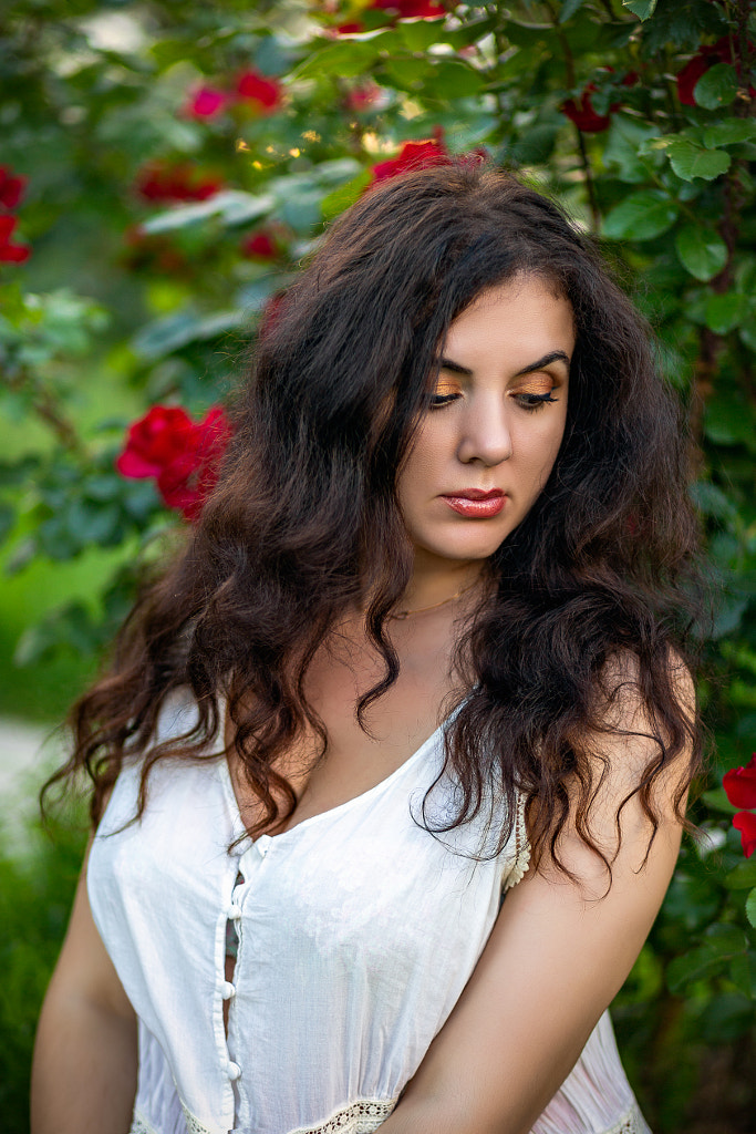 Portrait in the rose bush by photoduo on 500px.com