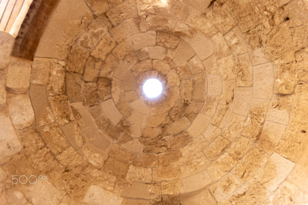 Mount Herodion and the ruins of the fortress of King Herod inside an by ...