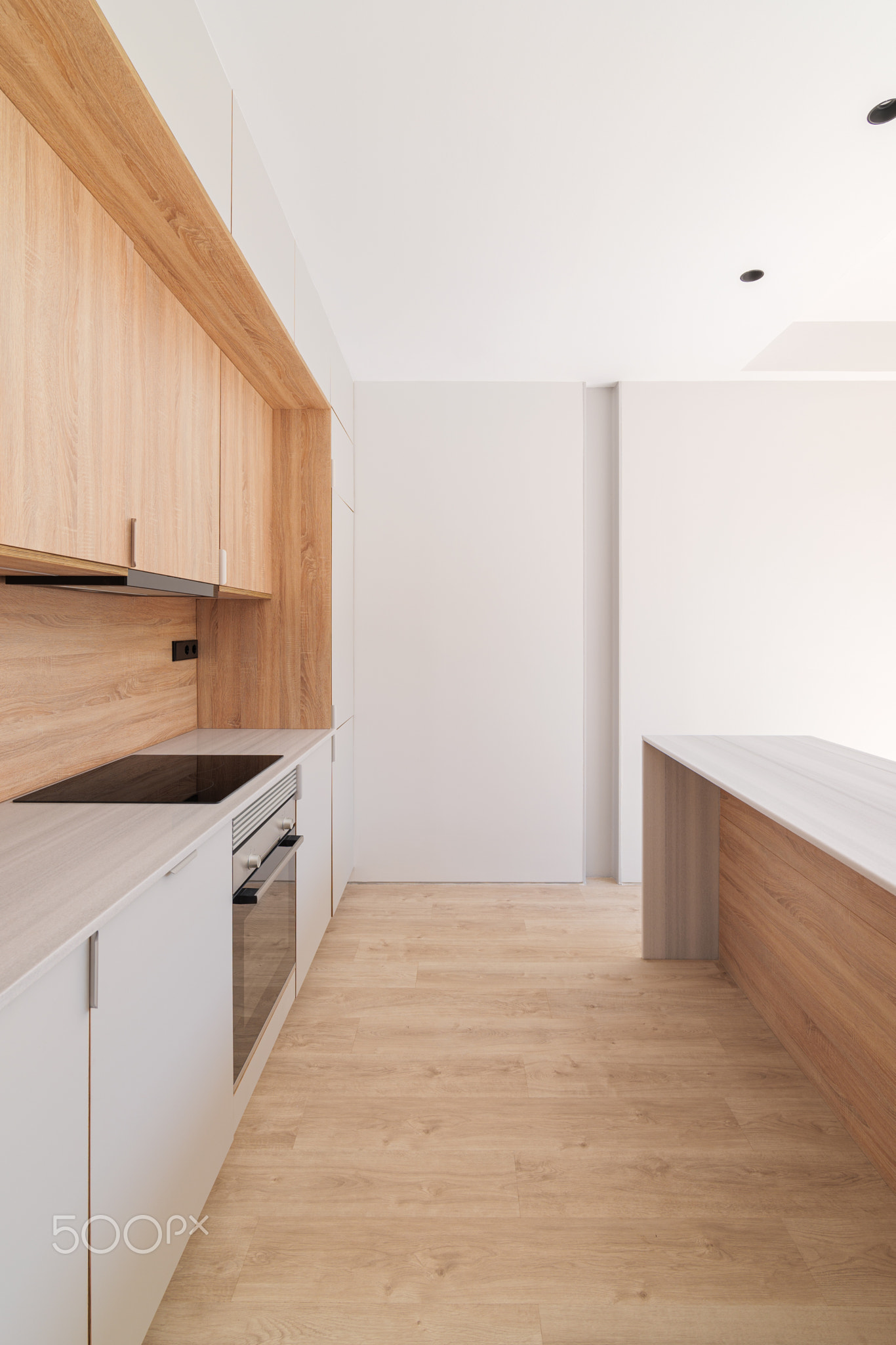 Modern kitchen interior with island and wooden furniture. Empty and