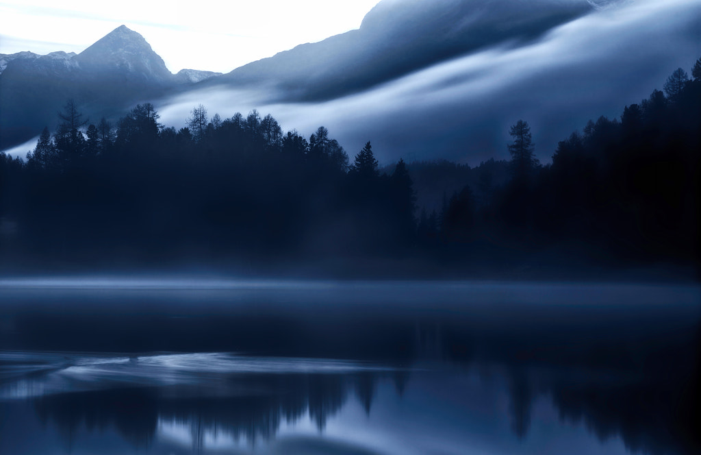 Blue foggy hour at the mountain lake by Urs Geysir / 500px