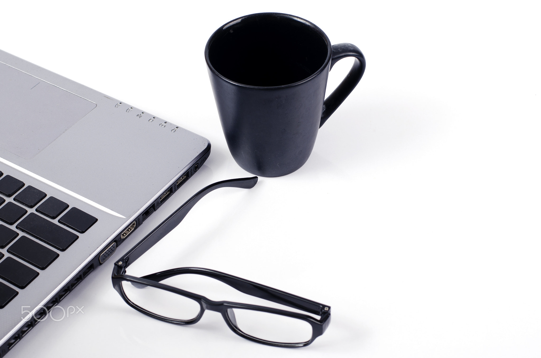 Life style technology with coffee cups and eyeglasses and labtop on