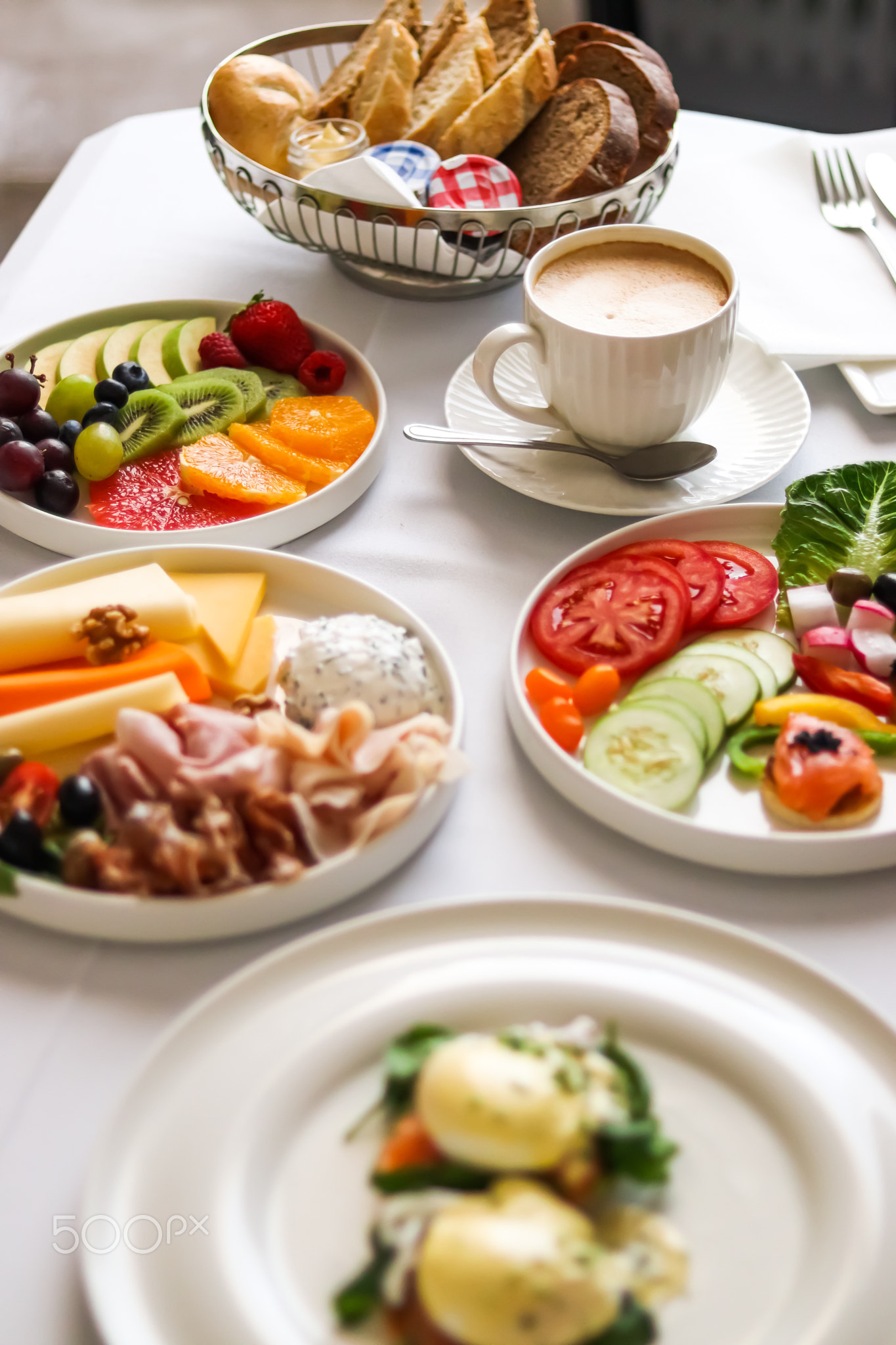 Luxury hotel and five star room service, various food platters, bread