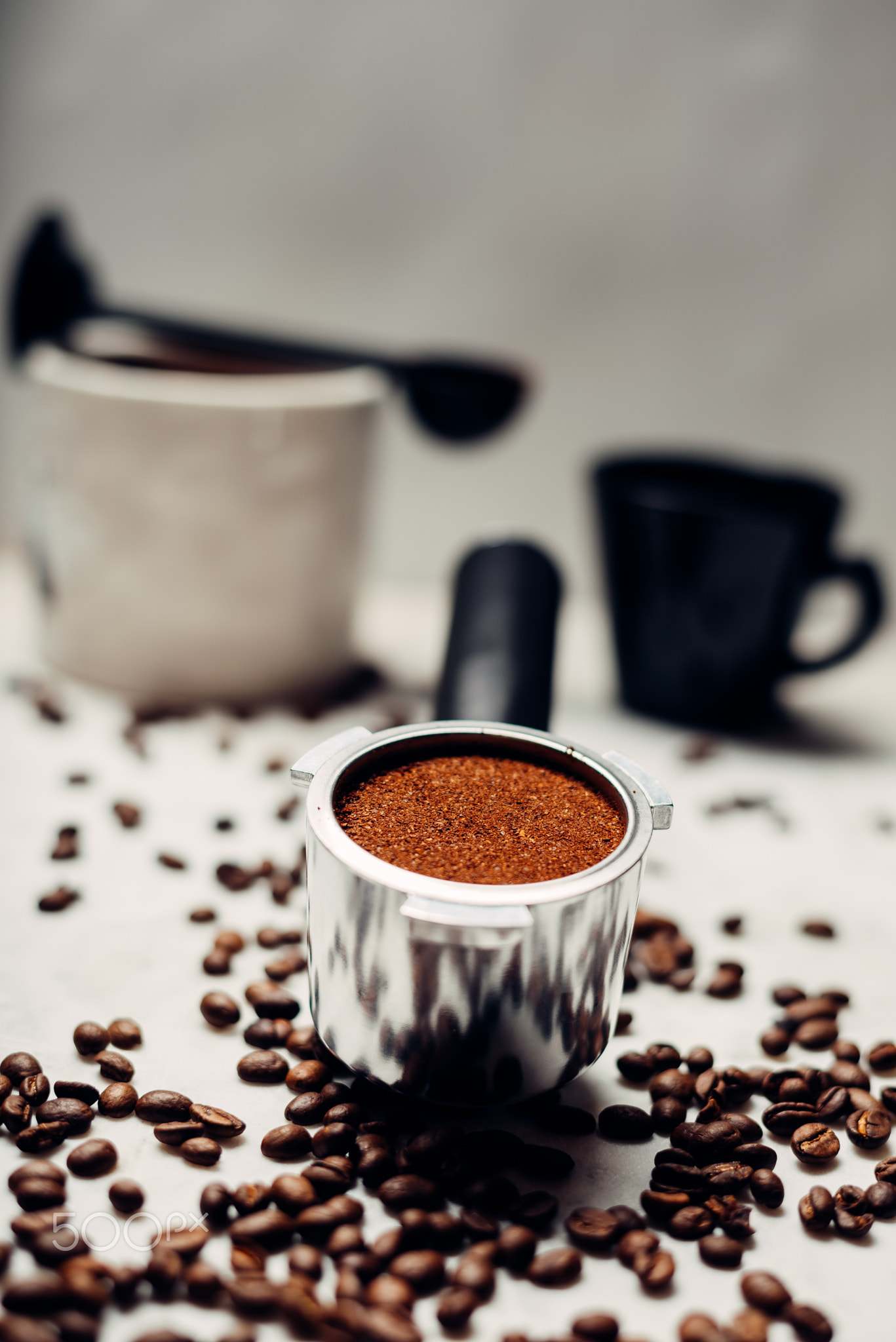 Portafilter for making coffee. Ground coffee with coffee beans.