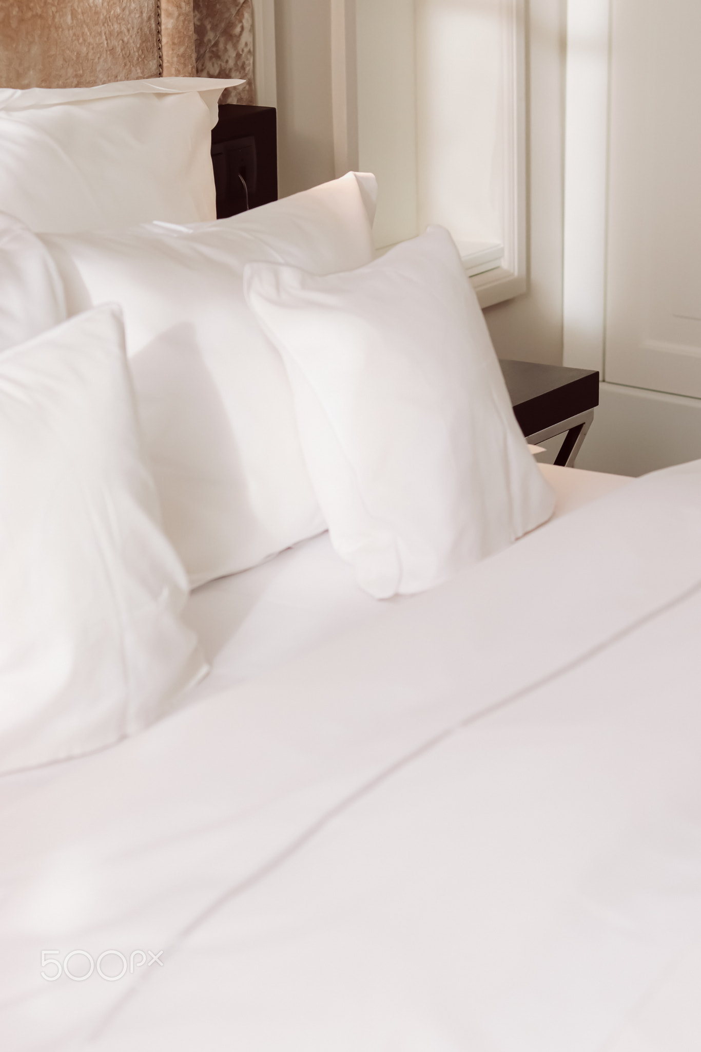 Home decor and interior design, bed with white bedding in luxury