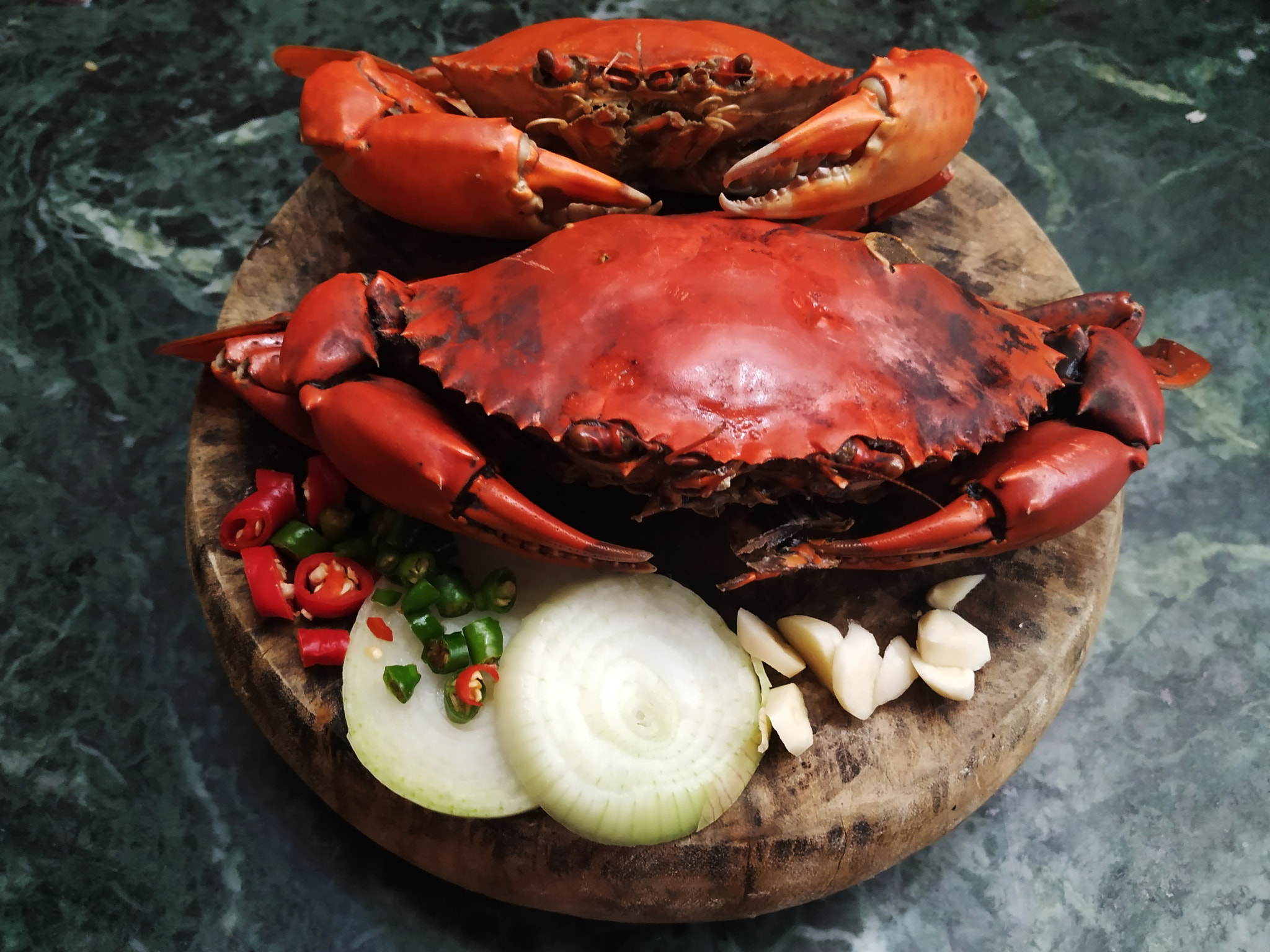 crab on a wooden mat