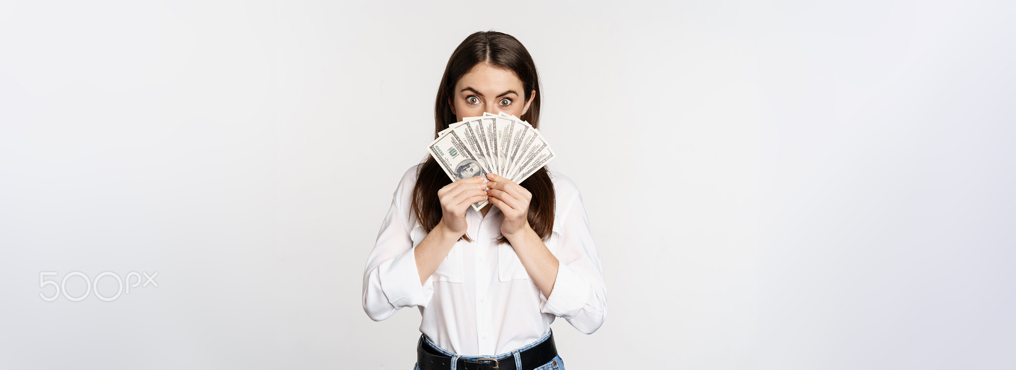 Enthusiastic woman showing money, cash and smiling, got loan, micro