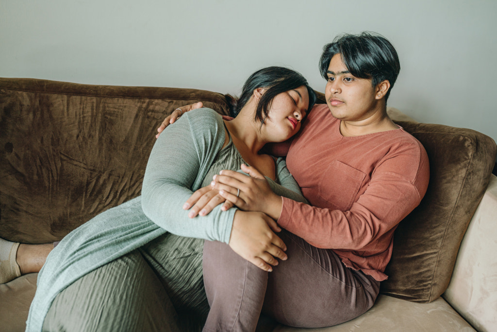 Lesbian Couple Are Laying On A Sofa By Natalie Zotova 500px 