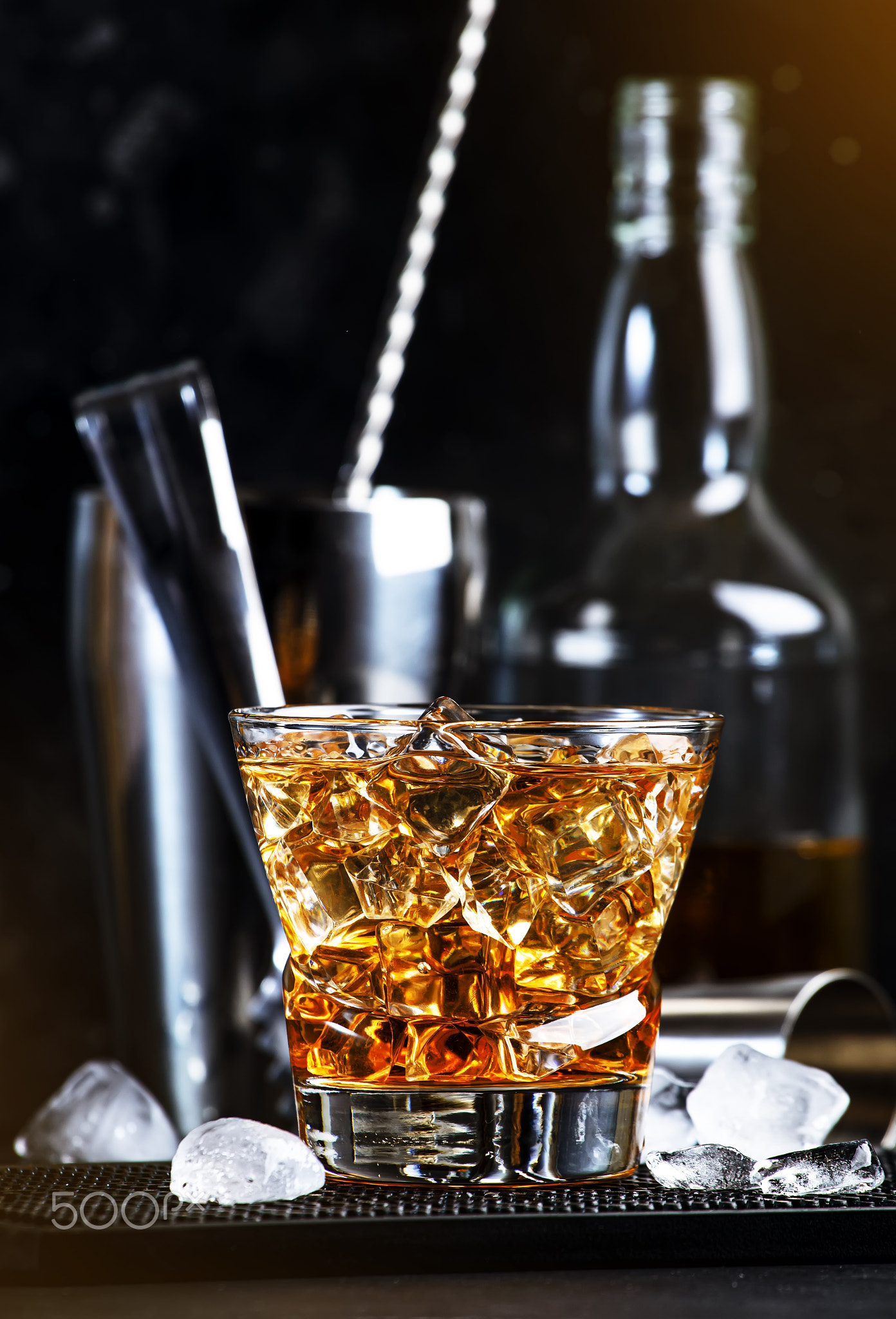 Godfather alcoholic cocktail with scotch whiskey, amaretto liqueur and ice
