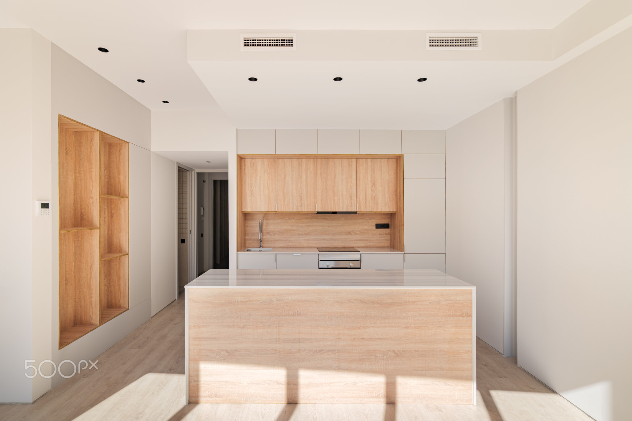 Light modular kitchen with cupboard design interior, made in white and