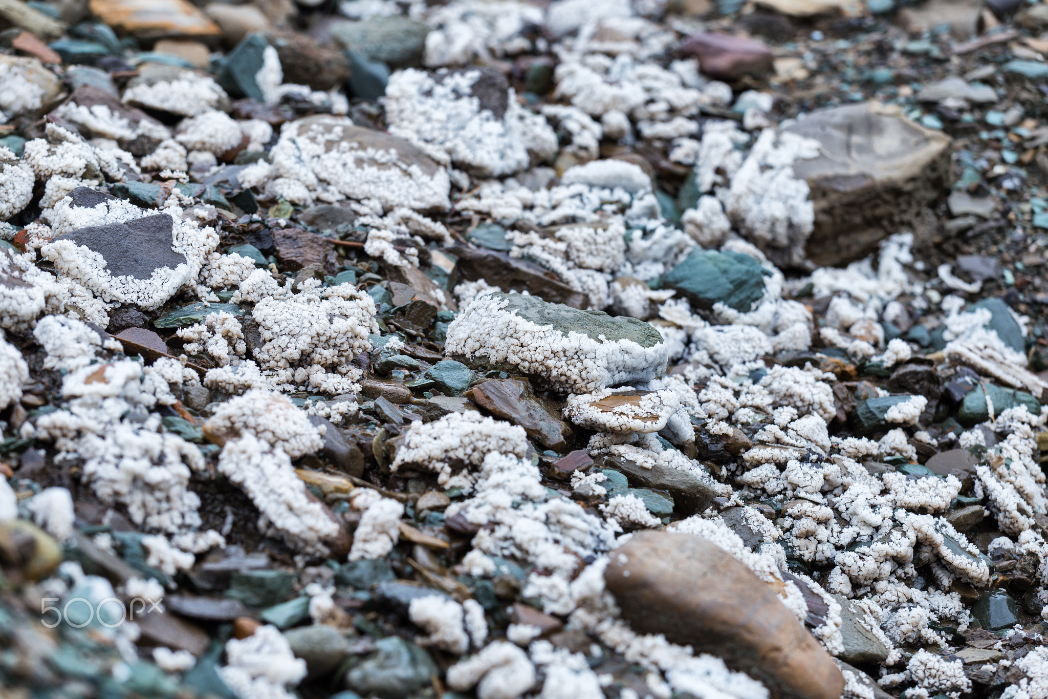 Natural rough salt on stones 